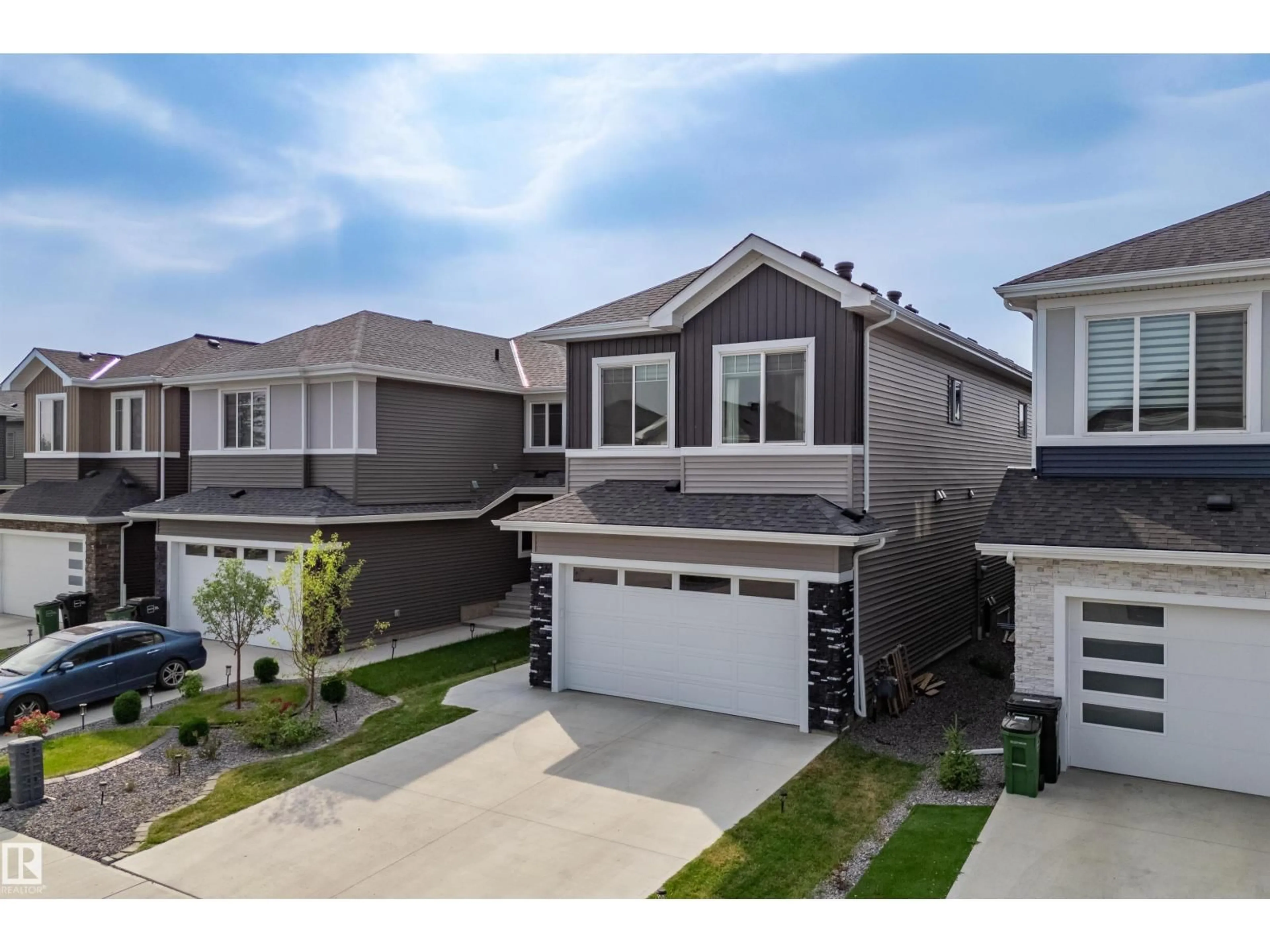 Home with vinyl exterior material, street for SW - 3316 158 ST, Edmonton Alberta T6W5A1