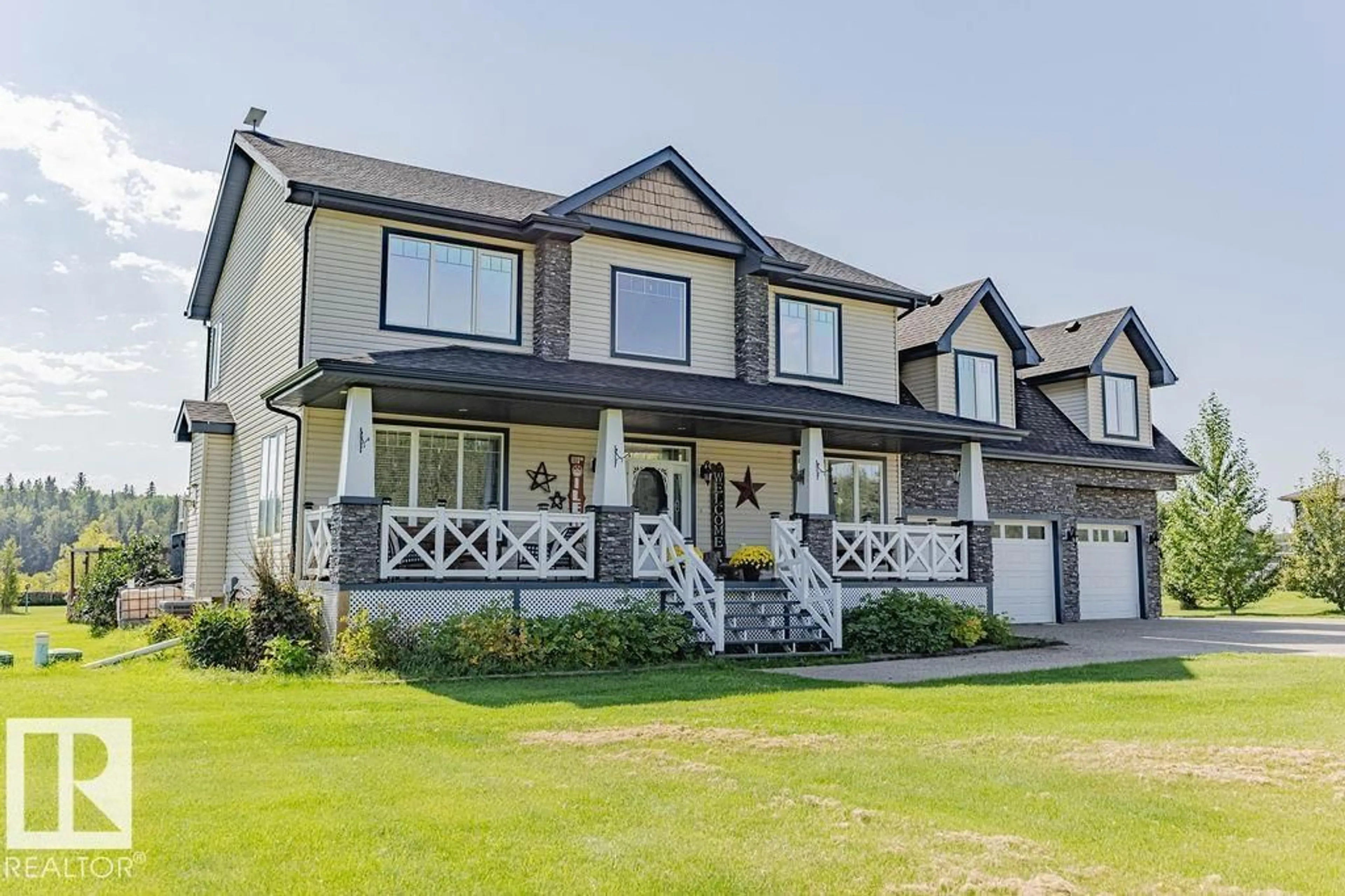 Home with vinyl exterior material, street for 55109 - 421 HWY 777, Rural Lac Ste. Anne County Alberta T0E1V0