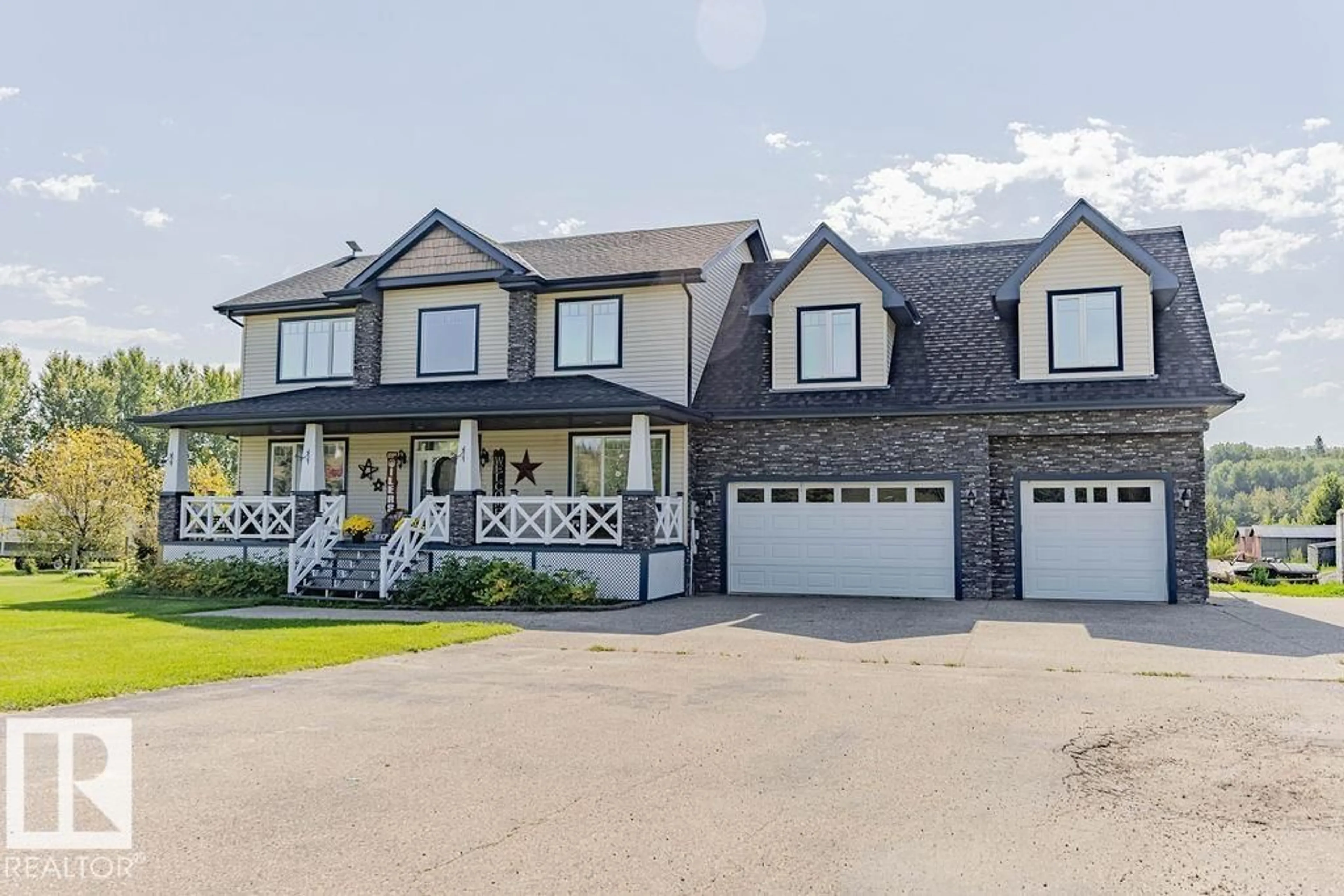 Home with vinyl exterior material, street for 55109 - 421 HWY 777, Rural Lac Ste. Anne County Alberta T0E1V0
