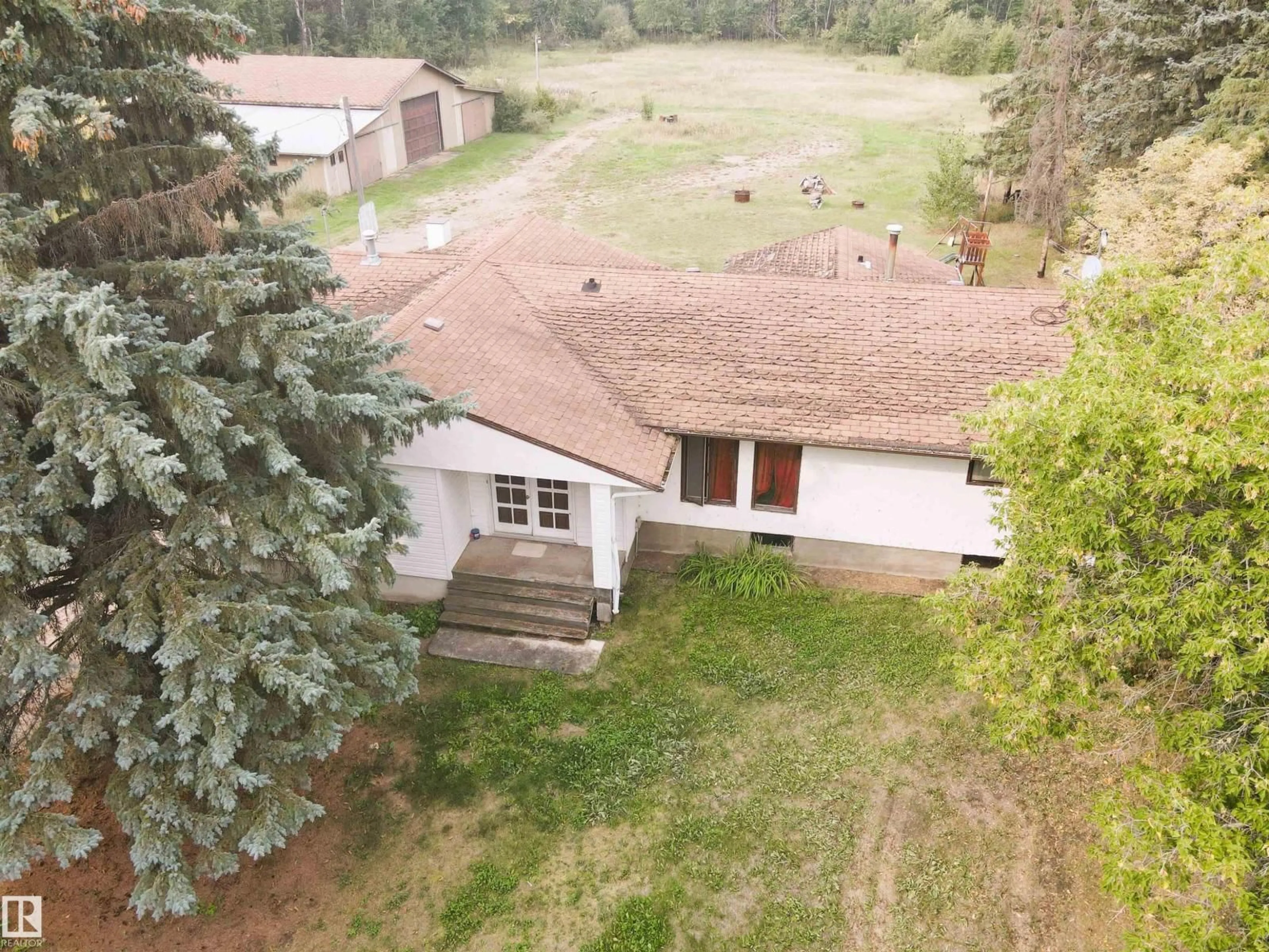 A pic from outside/outdoor area/front of a property/back of a property/a pic from drone, mountain view for 62106 RGE RD 455, Rural Bonnyville M.D. Alberta T9N0H3