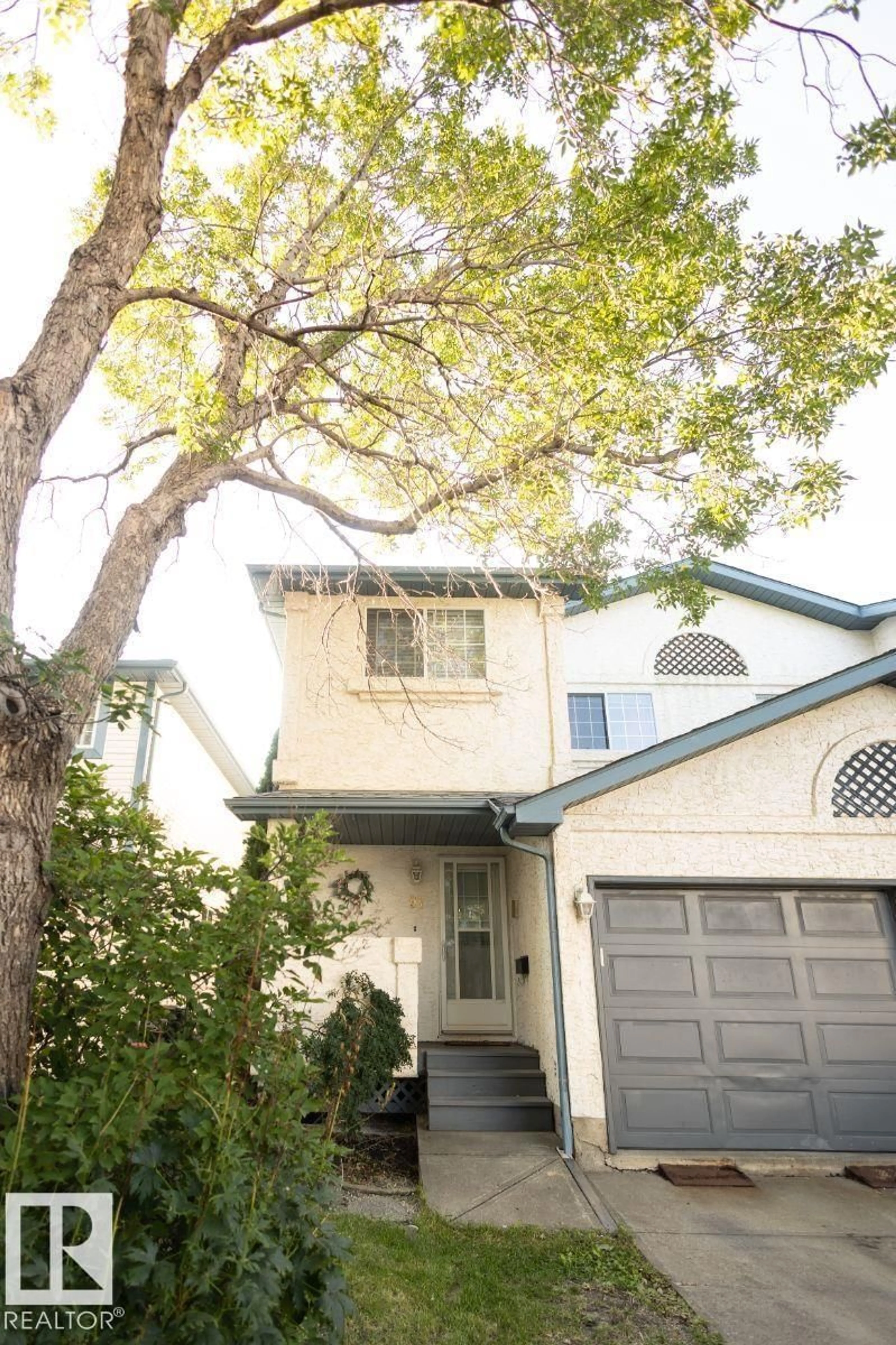 Home with vinyl exterior material, street for #97 - 501 YOUVILLE E, Edmonton Alberta T6L6T8