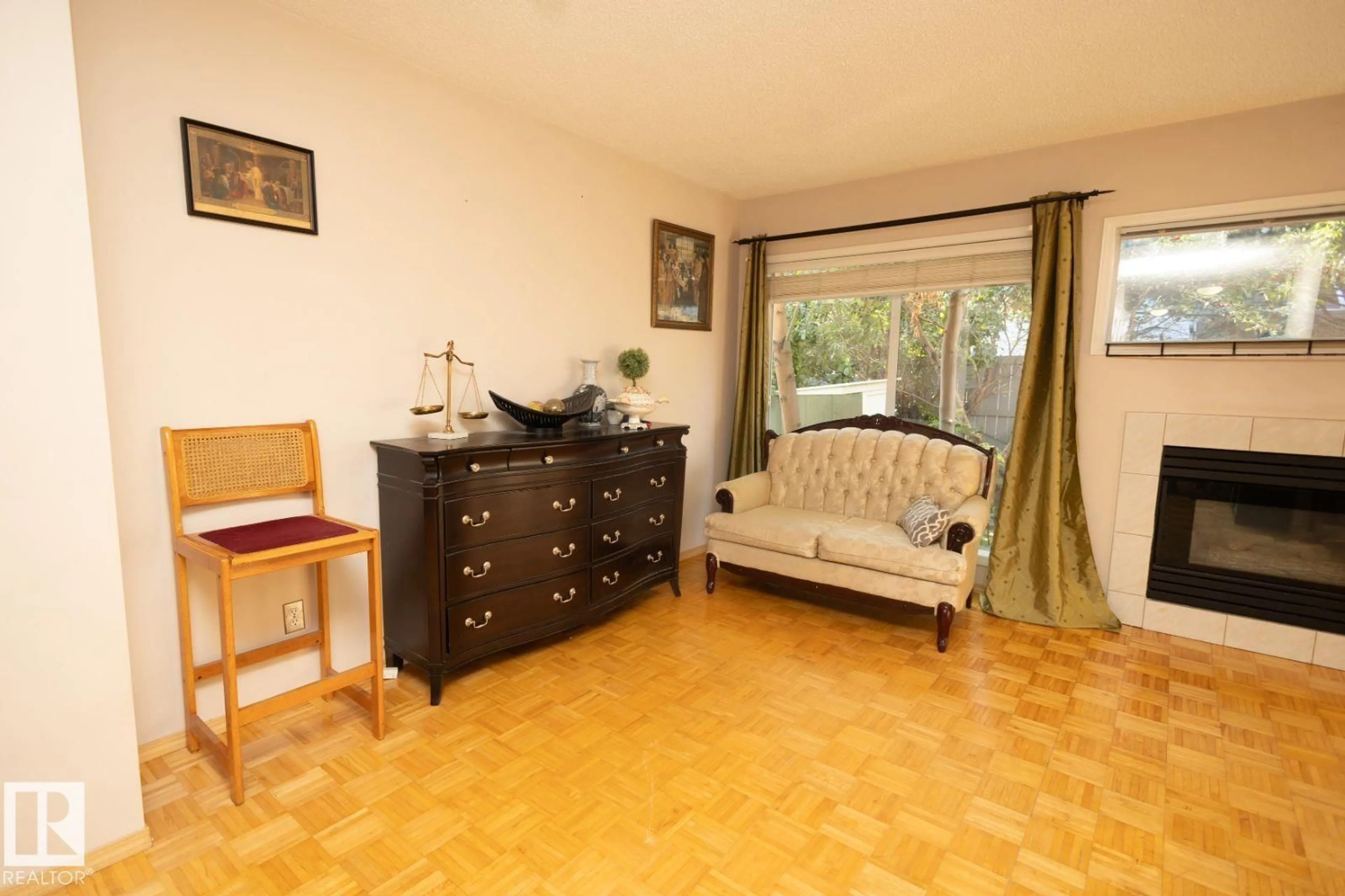 Living room with furniture, wood/laminate floor for #97 - 501 YOUVILLE E, Edmonton Alberta T6L6T8