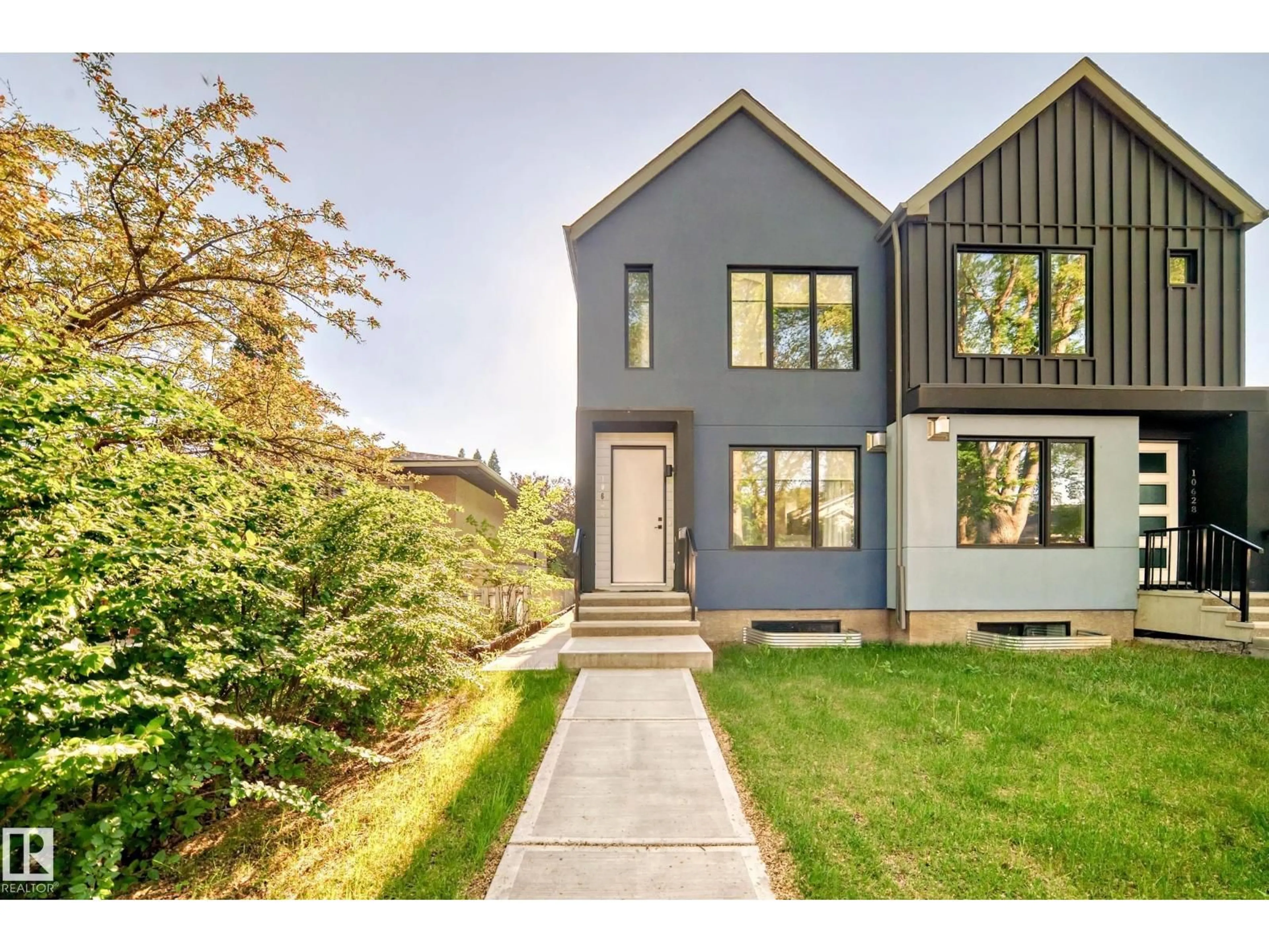 Home with vinyl exterior material, street for NW - 10626 81 ST, Edmonton Alberta T6A3L4