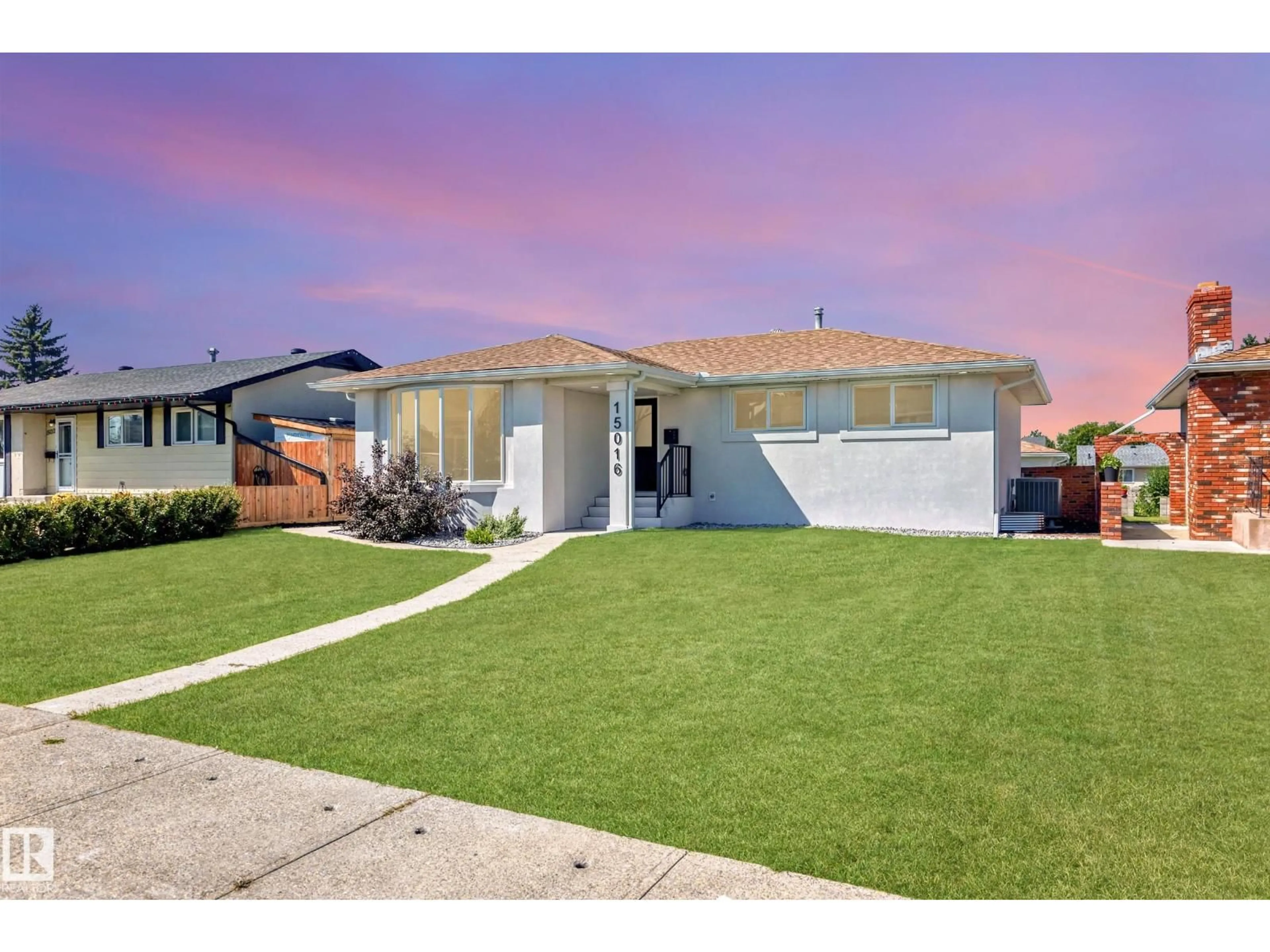 Home with vinyl exterior material, street for 15016 88 ST, Edmonton Alberta T5E5T5