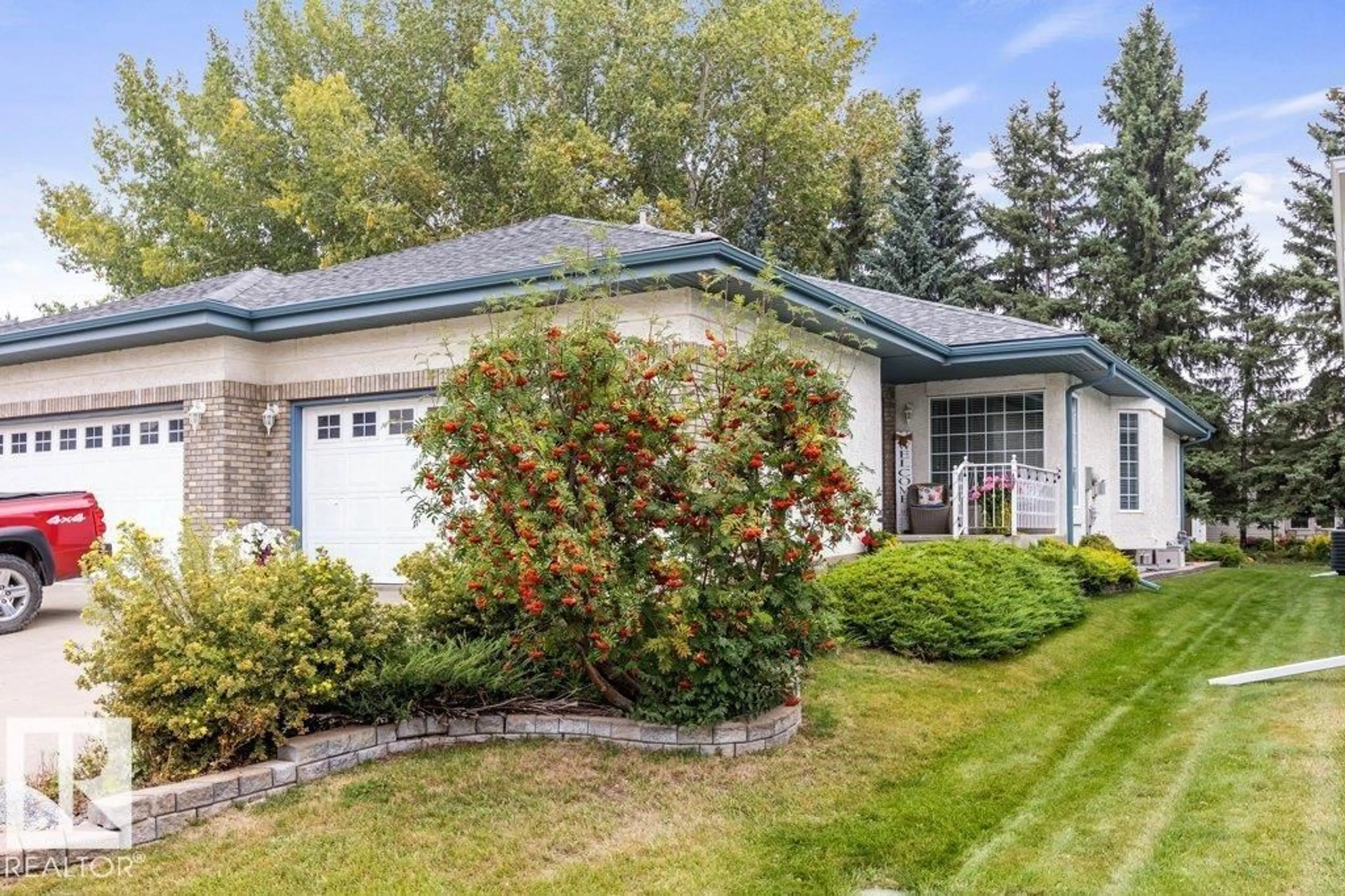 Home with vinyl exterior material, street for 21 EDWARD WY, St. Albert Alberta T8N6N9
