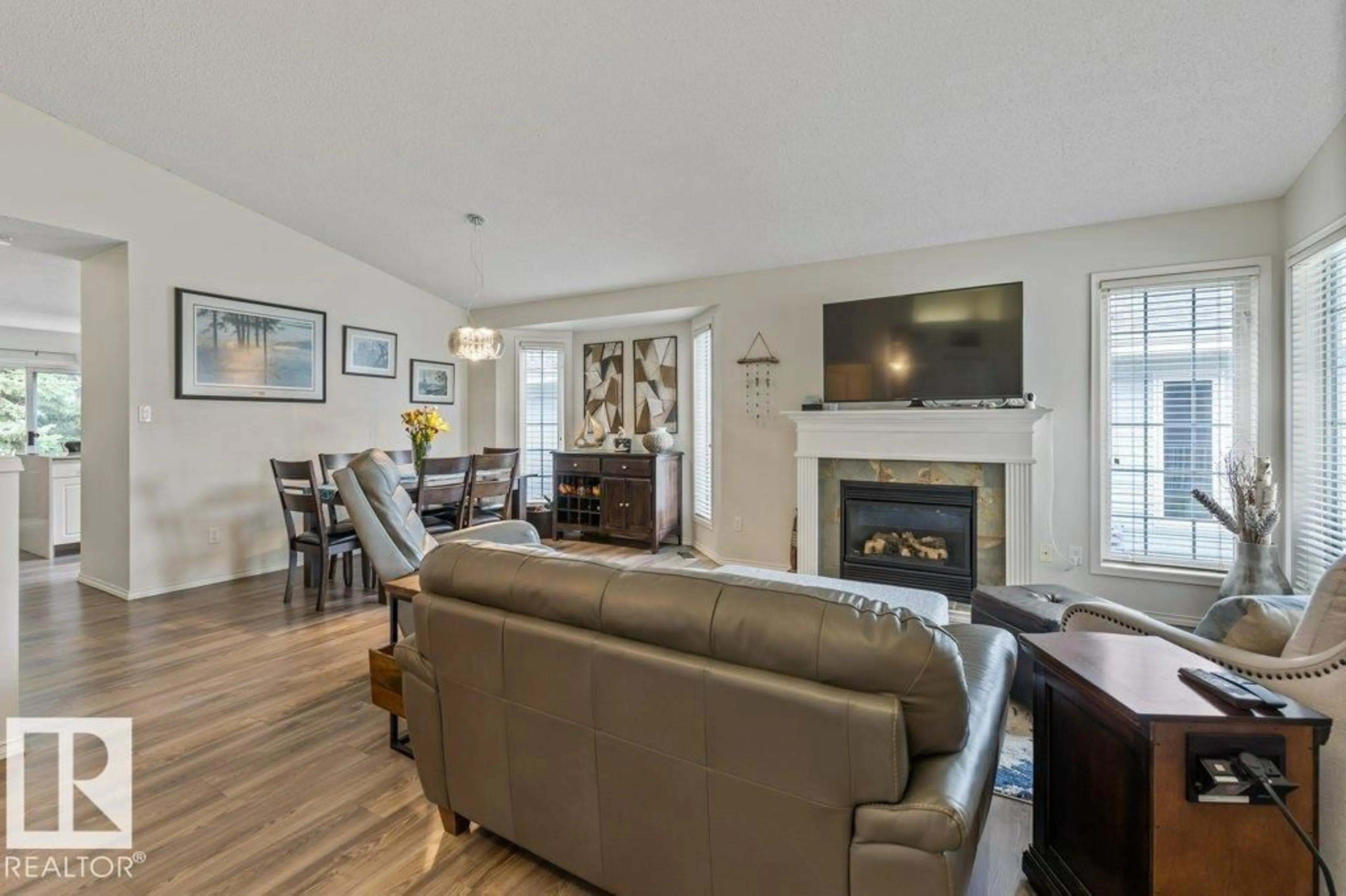 Living room with furniture, wood/laminate floor for 21 EDWARD WY, St. Albert Alberta T8N6N9