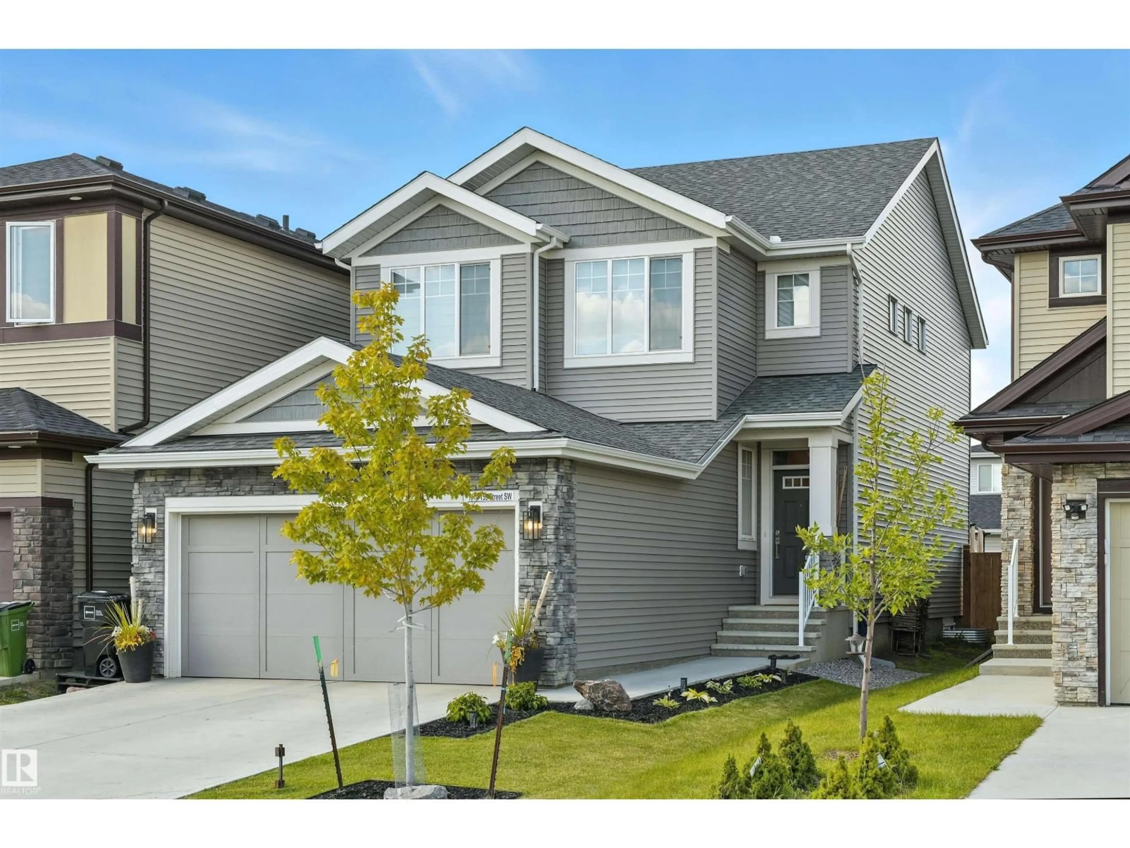 Home with vinyl exterior material, street for SW - 1914 159 ST, Edmonton Alberta T6W4X7