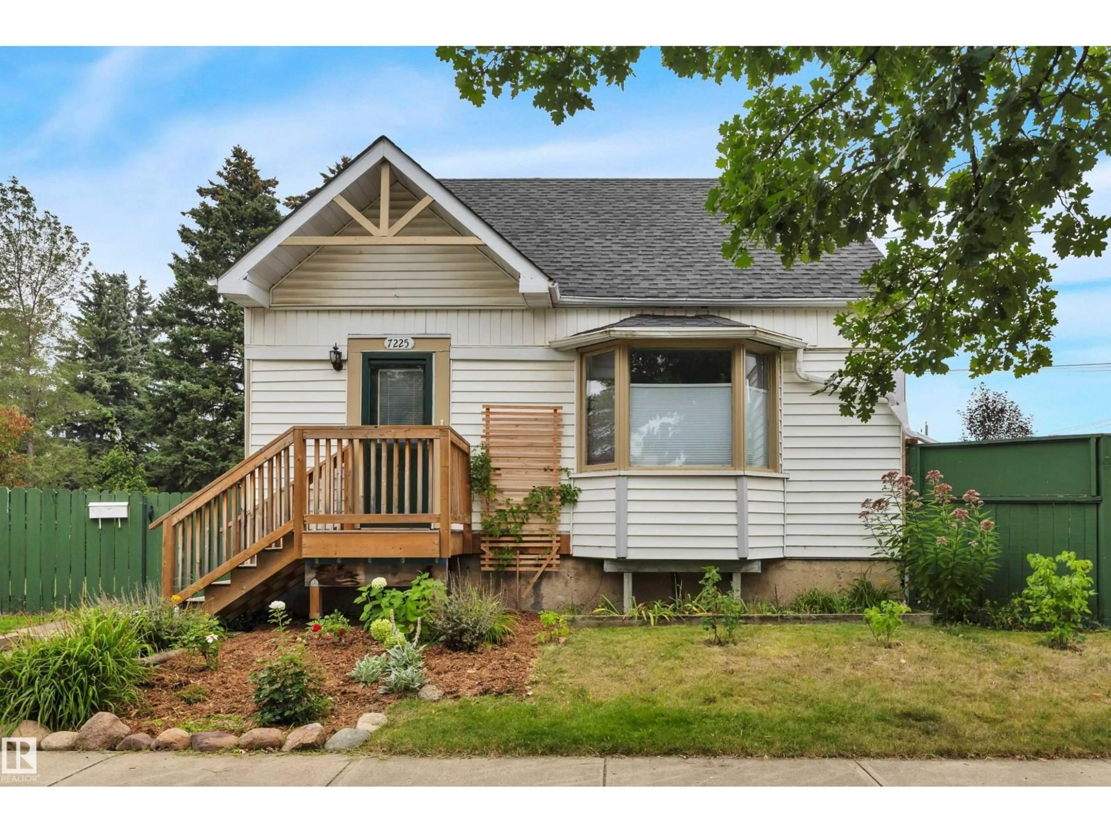 Home with vinyl exterior material, street for 7225 95 ST, Edmonton Alberta T6E3E8