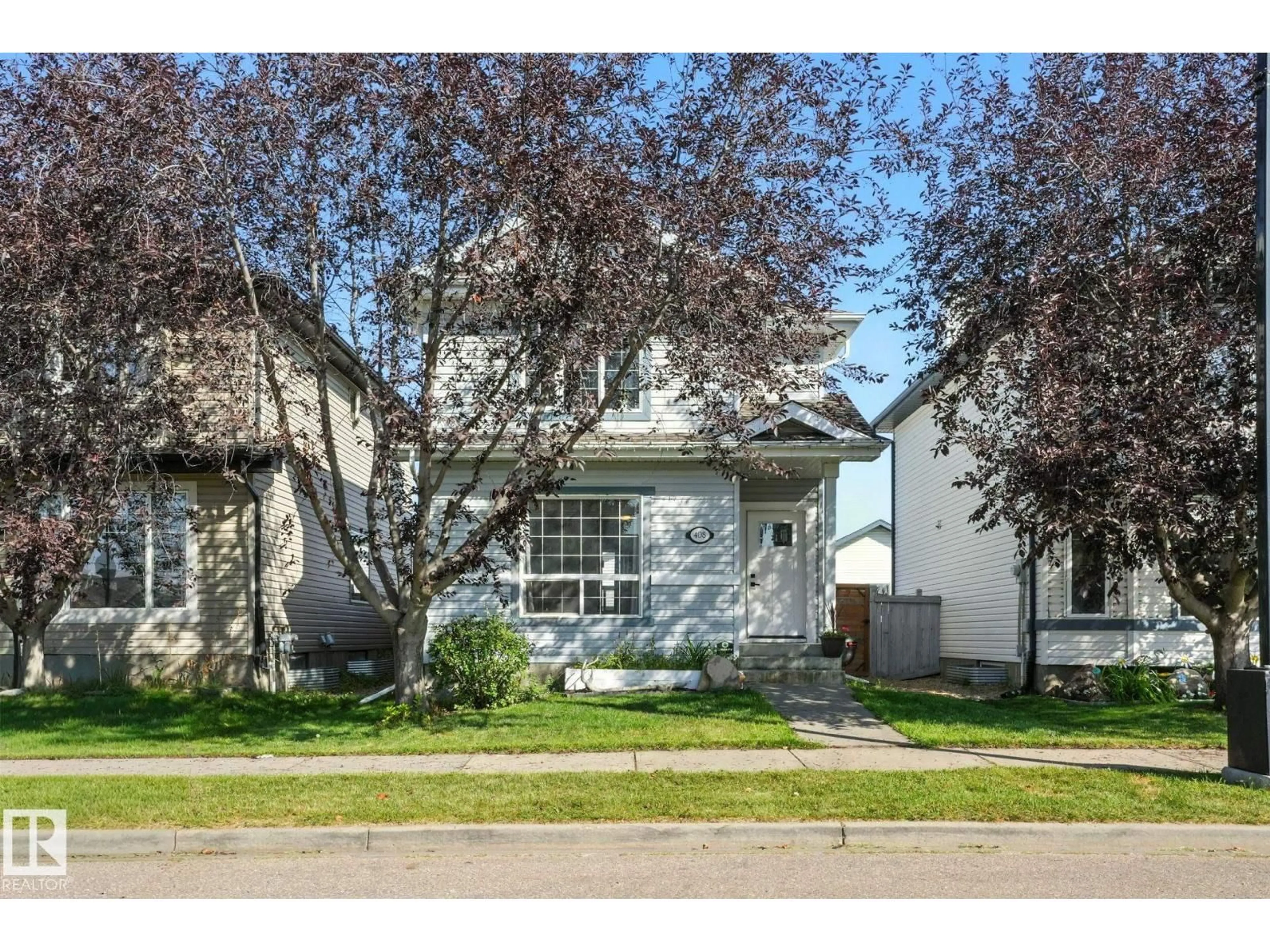 Home with vinyl exterior material, street for NW NW - 408 GIBB WD, Edmonton Alberta T5T6W8