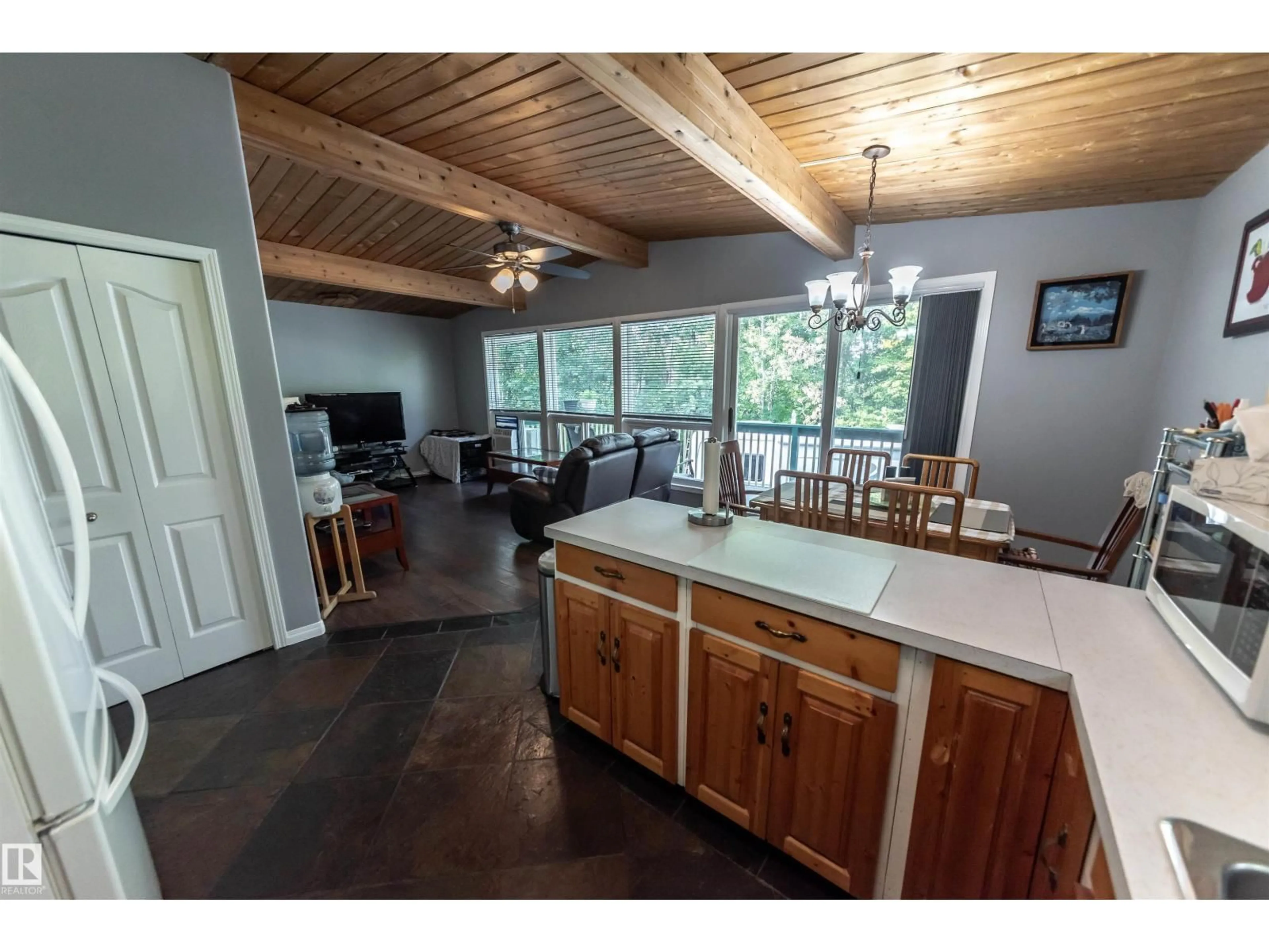 Open concept kitchen, wood/laminate floor for 5441 49 ST, Rural Lac Ste. Anne County Alberta T0E0A0