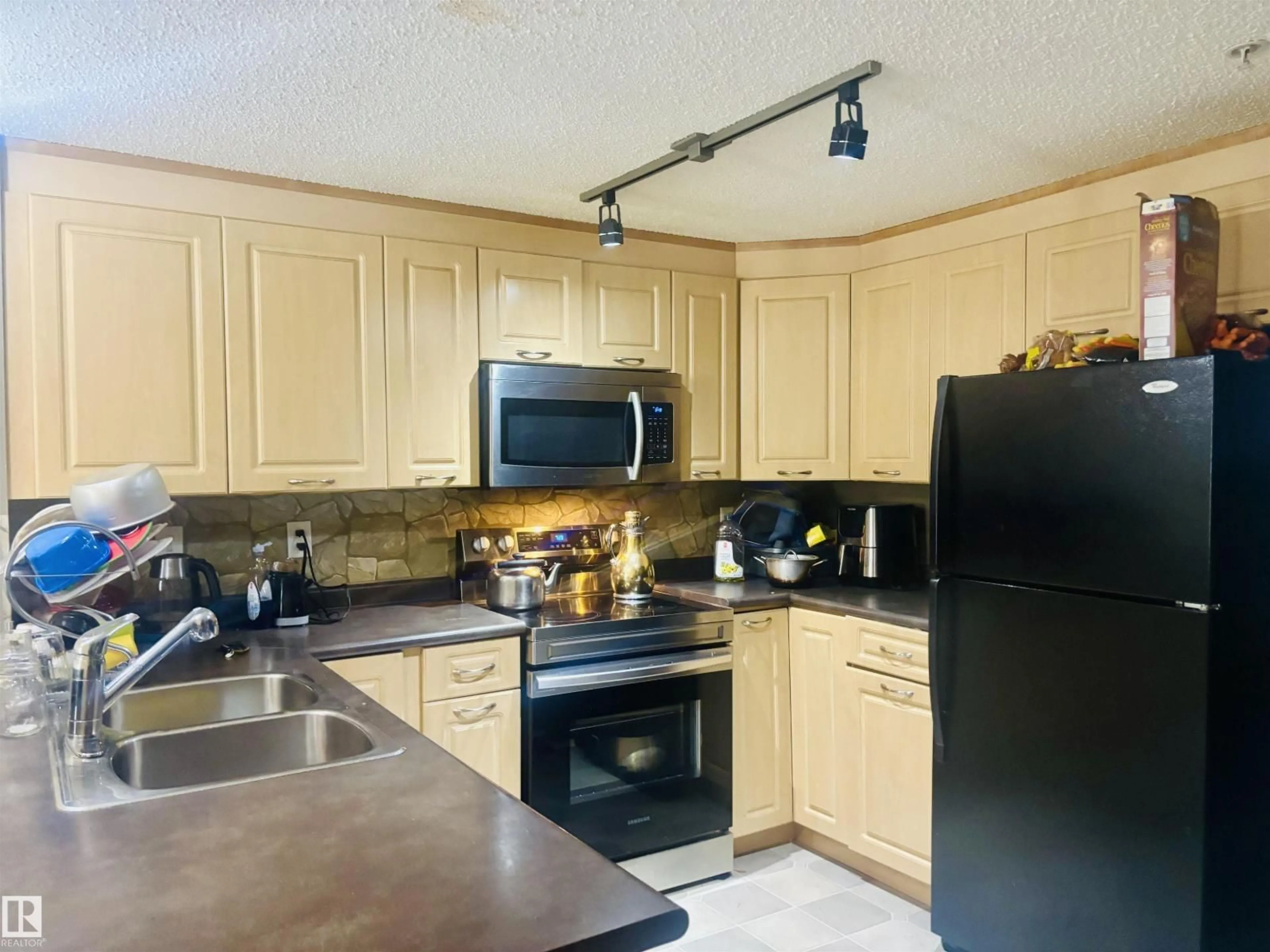 Standard kitchen, unknown for #307 - 6315 135 AV, Edmonton Alberta T5A5J7