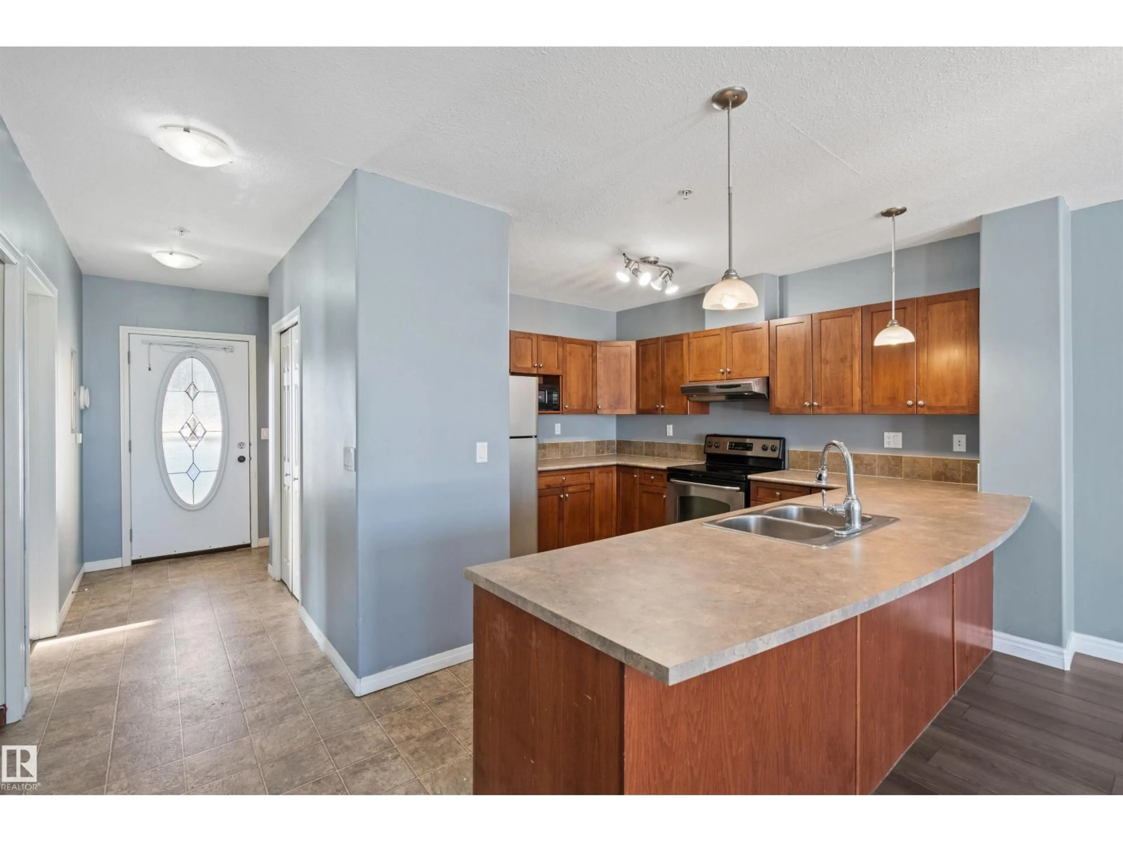Open concept kitchen, unknown for 209 - 802 12 ST, Cold Lake Alberta T9M0A7