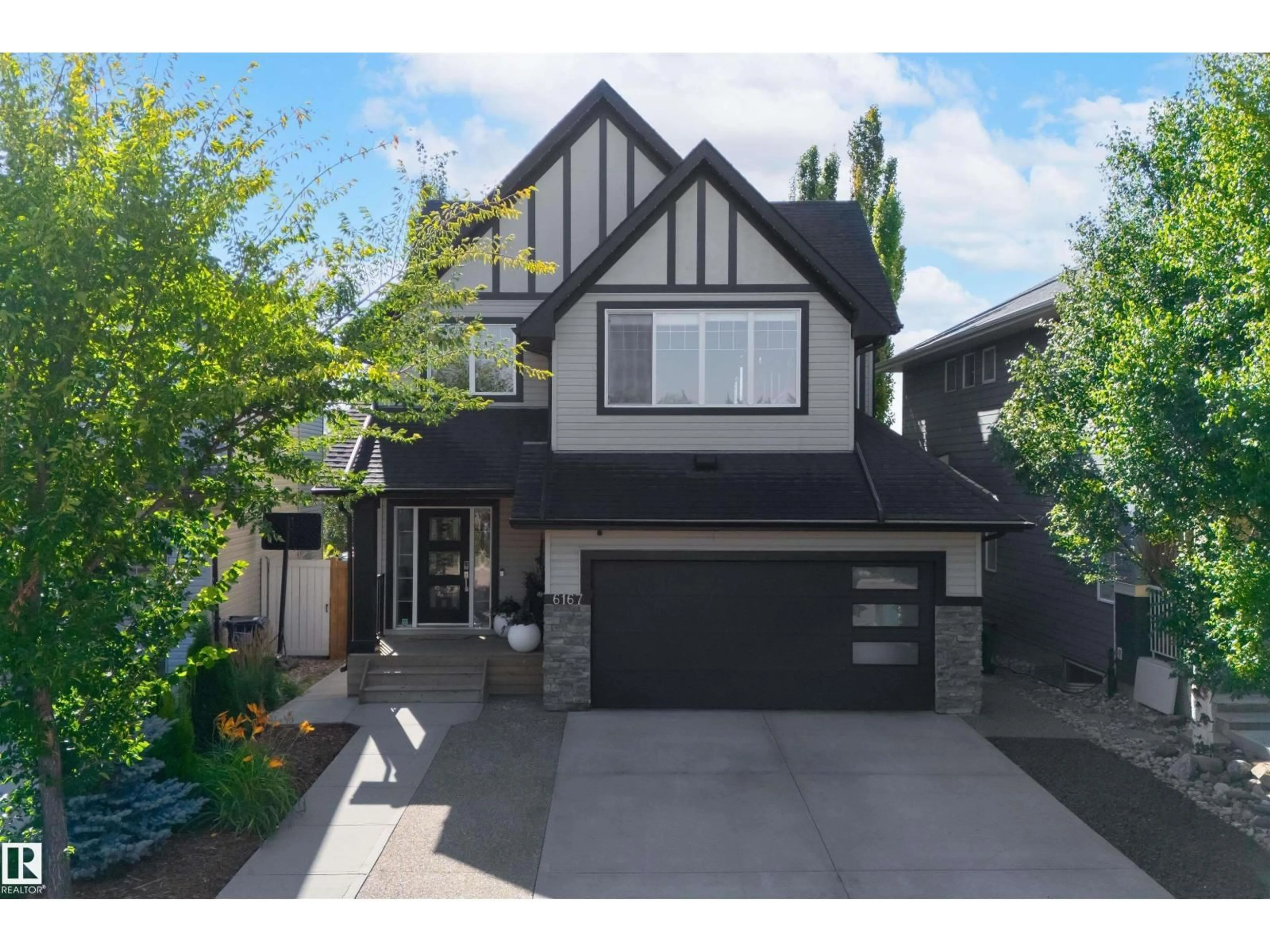 Home with vinyl exterior material, street for 6167 STINSON WY, Edmonton Alberta T6R0K3