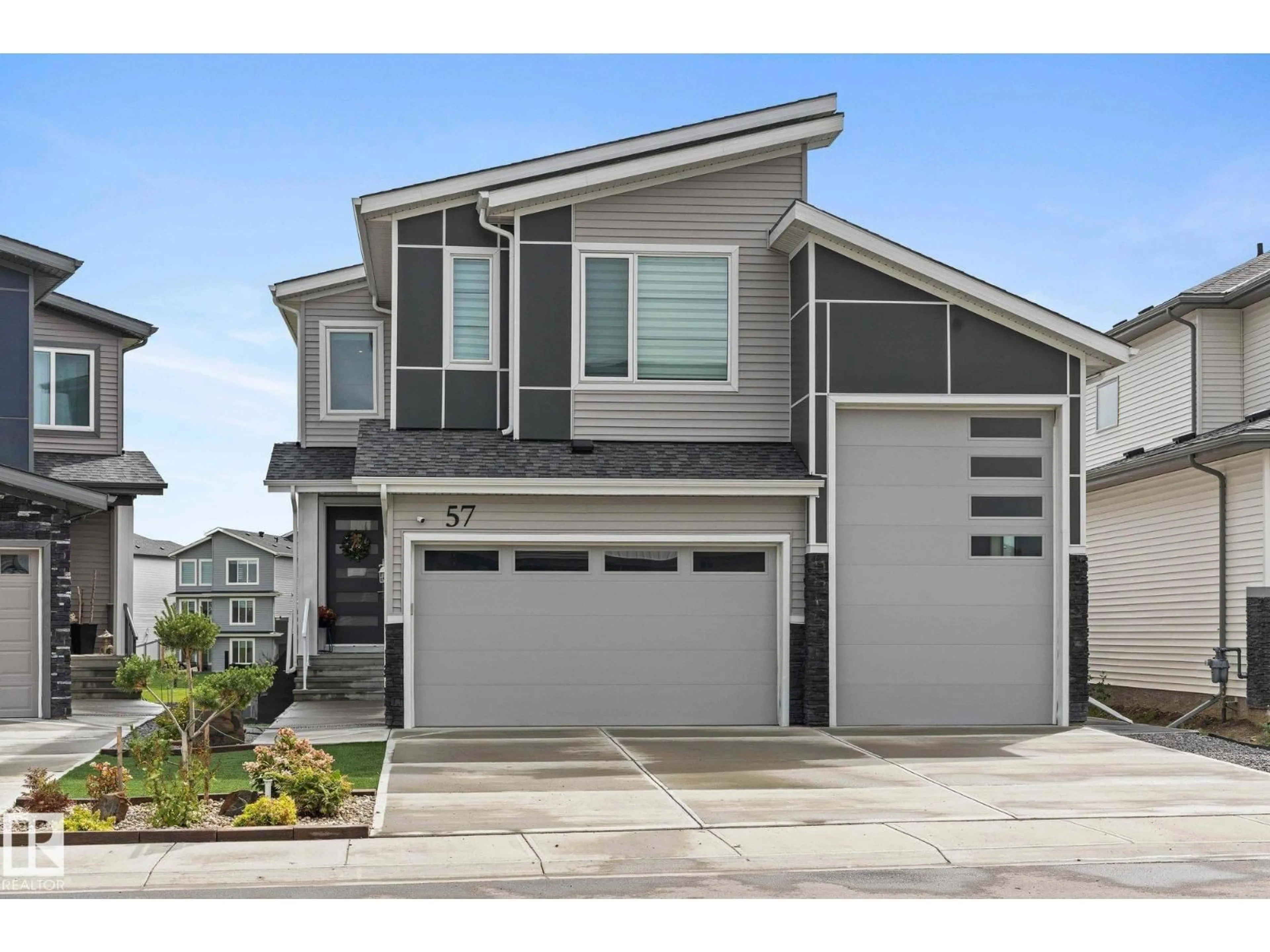 Home with vinyl exterior material, street for 57 DALQUIST BA, Leduc Alberta T9E0N5