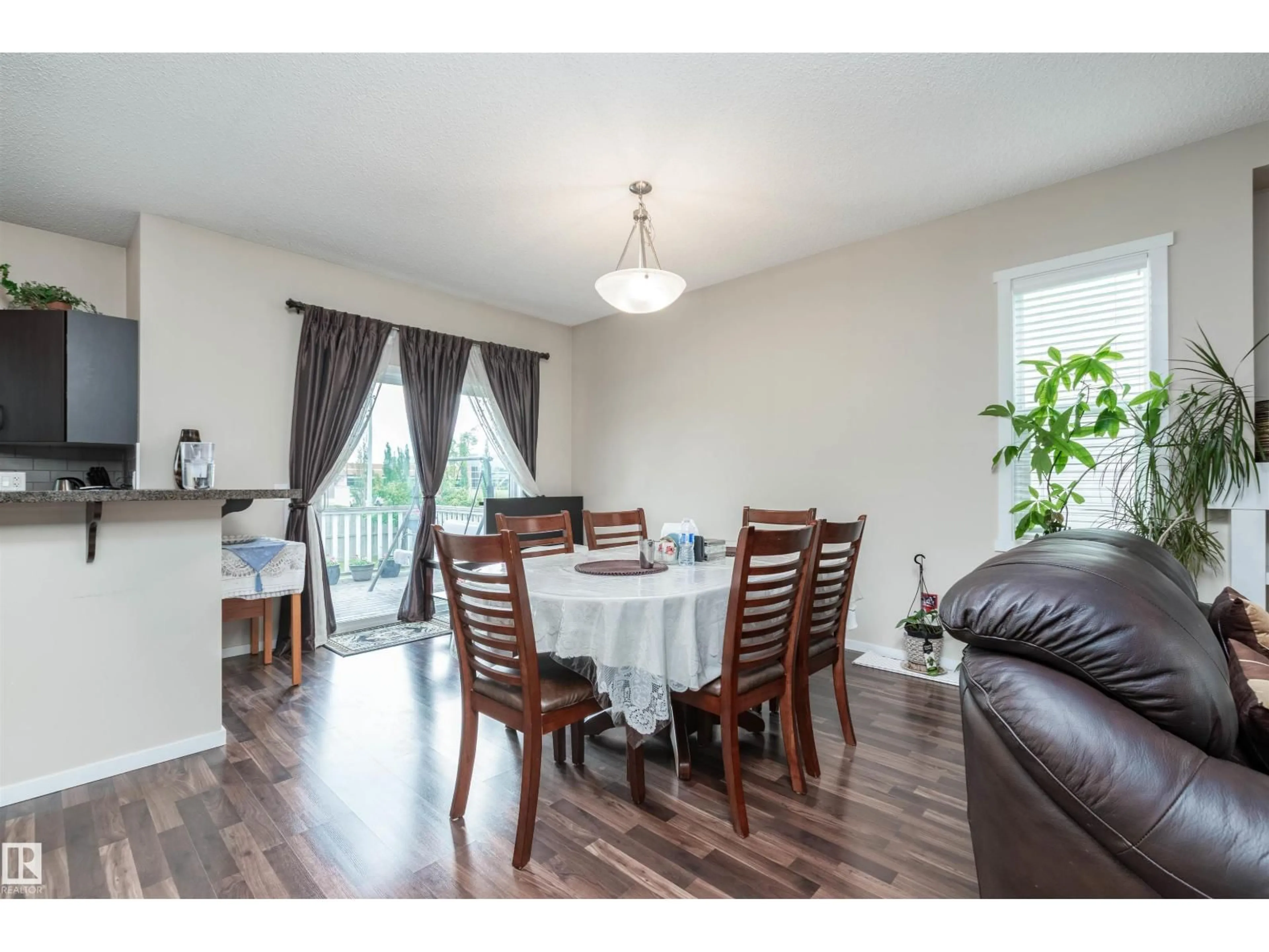 Dining room, wood/laminate floor for 7526 ELLESMERE WY, Sherwood Park Alberta T8H0P6