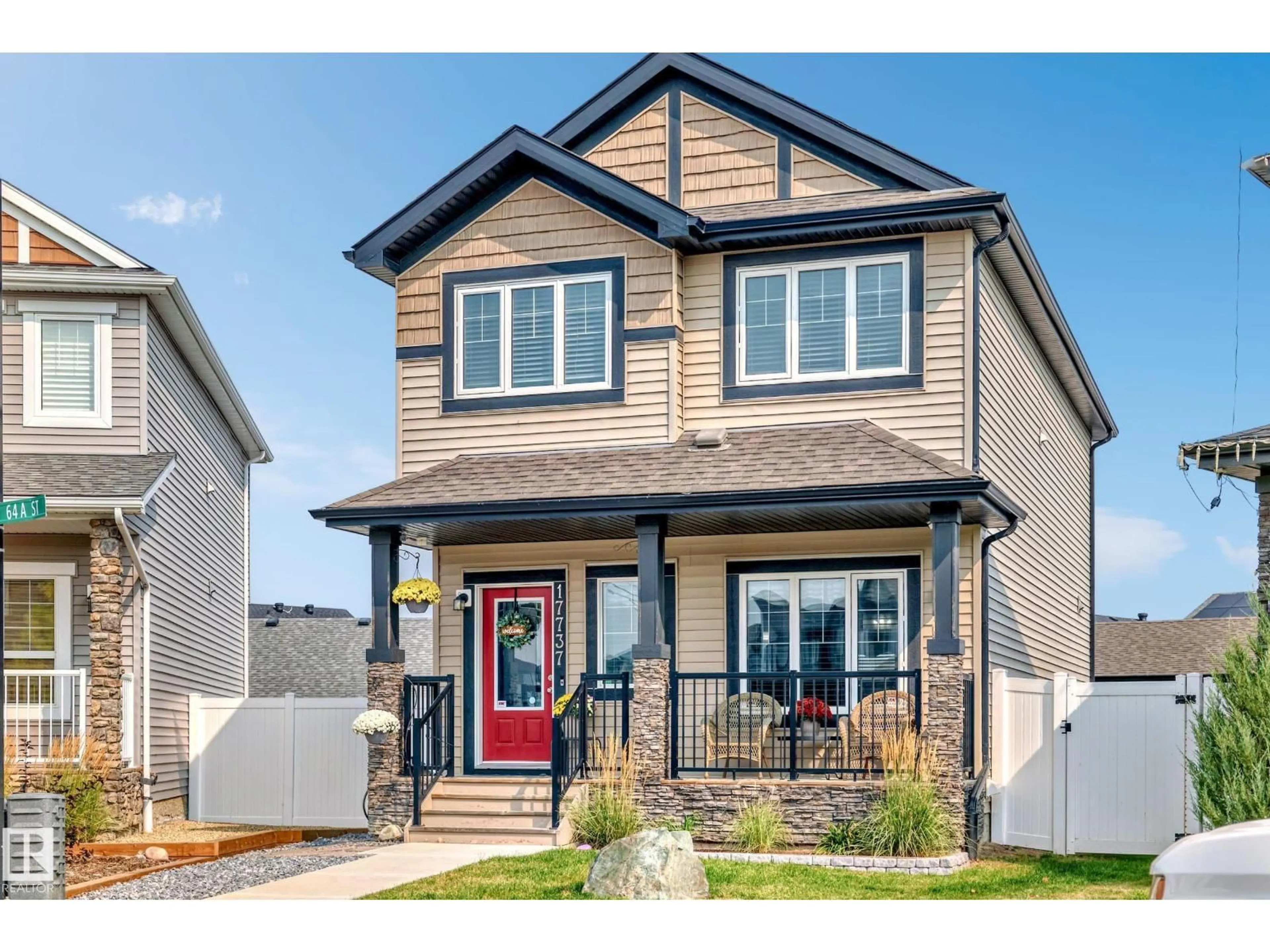 Home with vinyl exterior material, street for NW - 17737 64A ST, Edmonton Alberta T5Y3X4