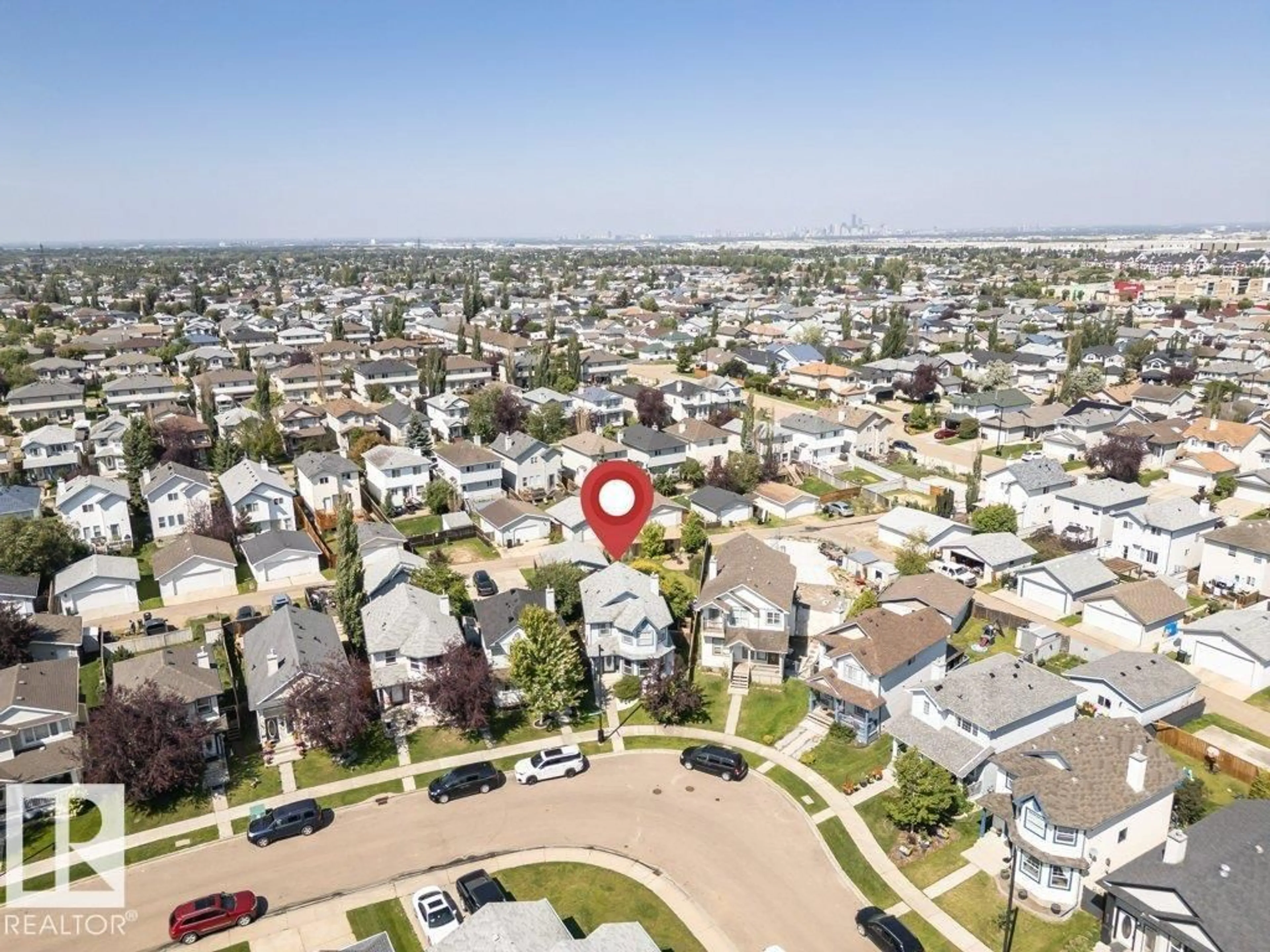 A pic from outside/outdoor area/front of a property/back of a property/a pic from drone, city buildings view from balcony for 643 WINDROSS CR, Edmonton Alberta T6T1Y1