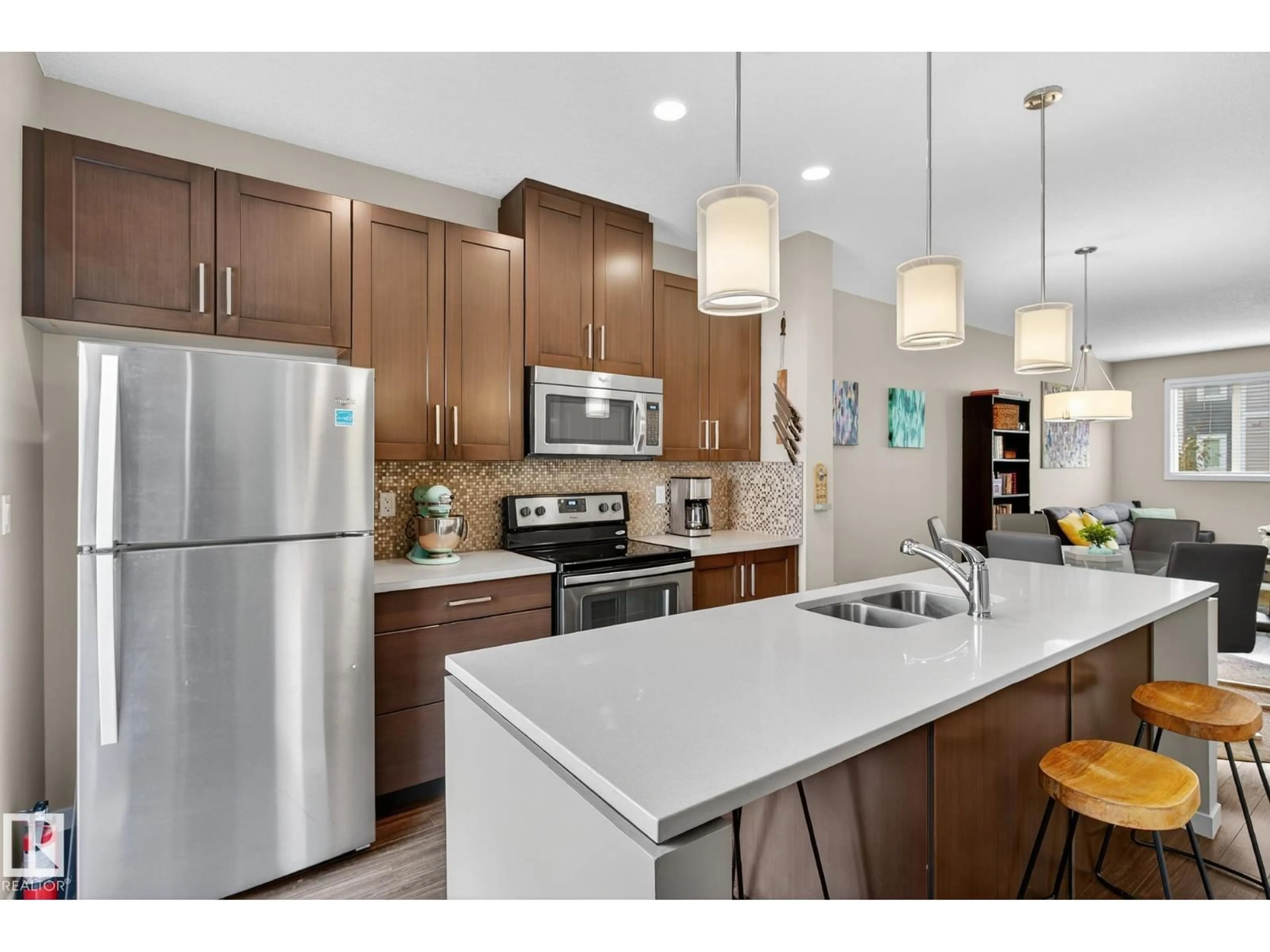 Open concept kitchen, unknown for 320 - 74 SECORD BV, Edmonton Alberta T5T7E8