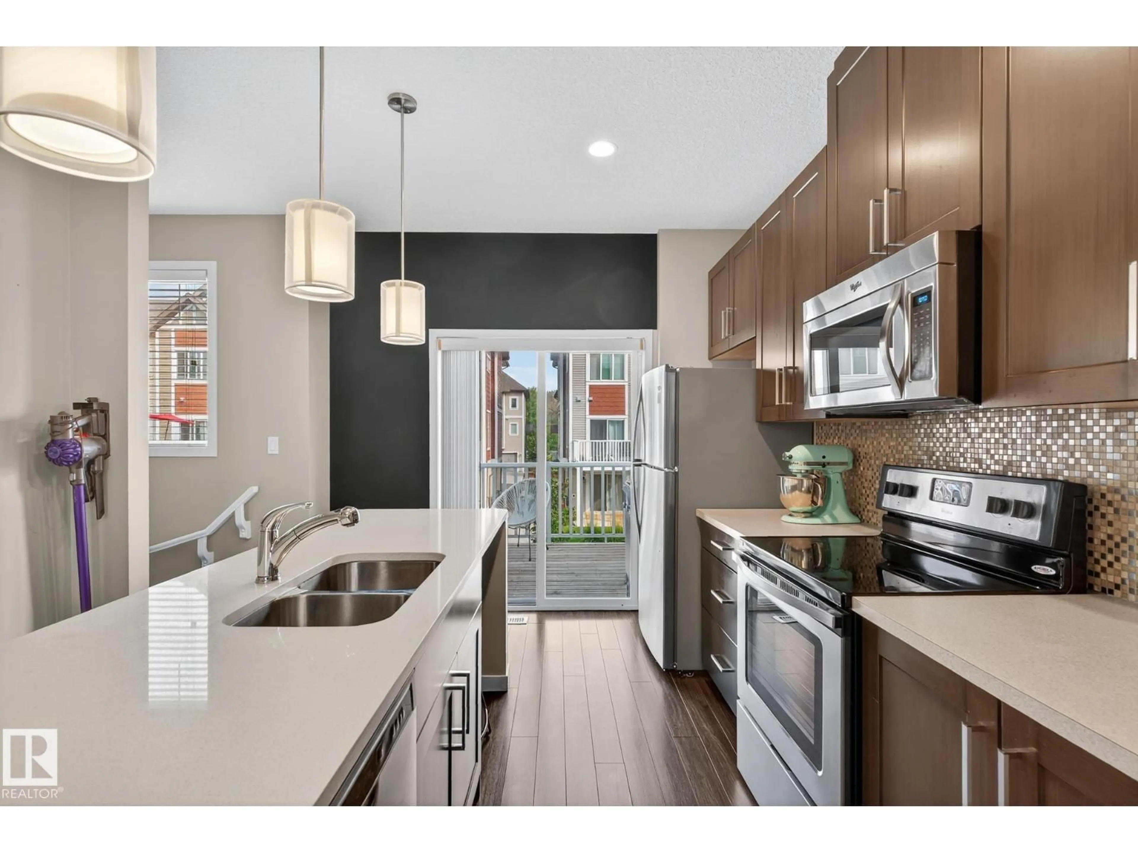 Open concept kitchen, unknown for 320 - 74 SECORD BV, Edmonton Alberta T5T7E8