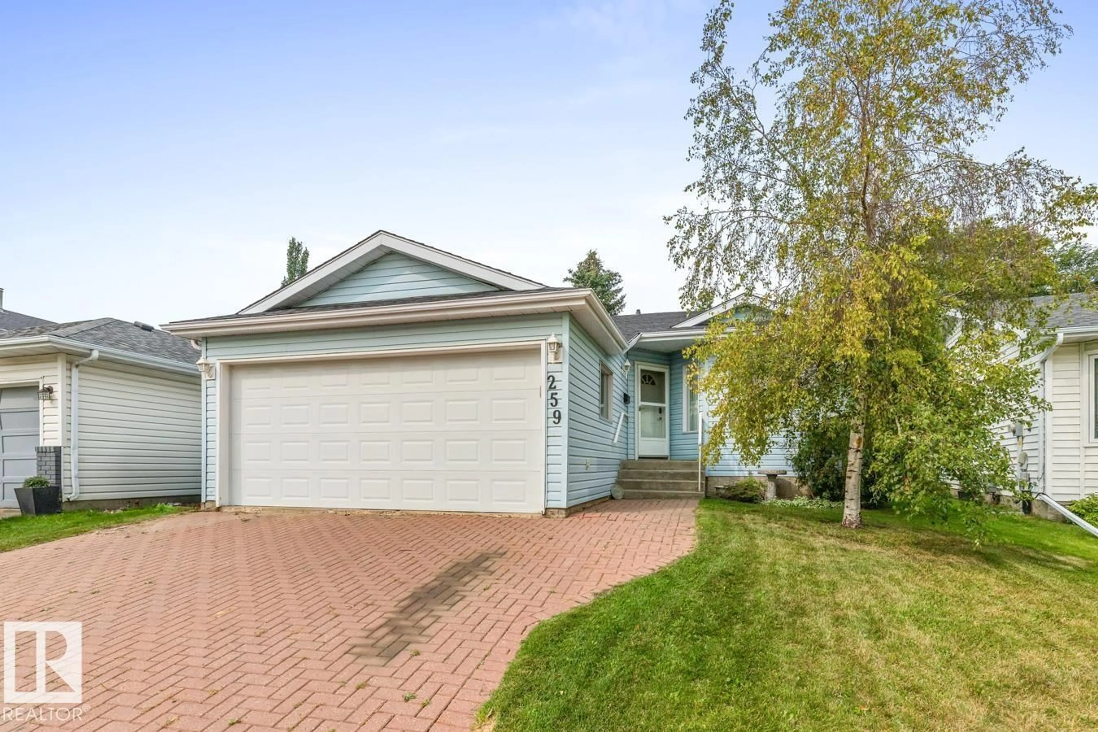 Home with vinyl exterior material, street for 259 REGENCY DR, Sherwood Park Alberta T8A5P4