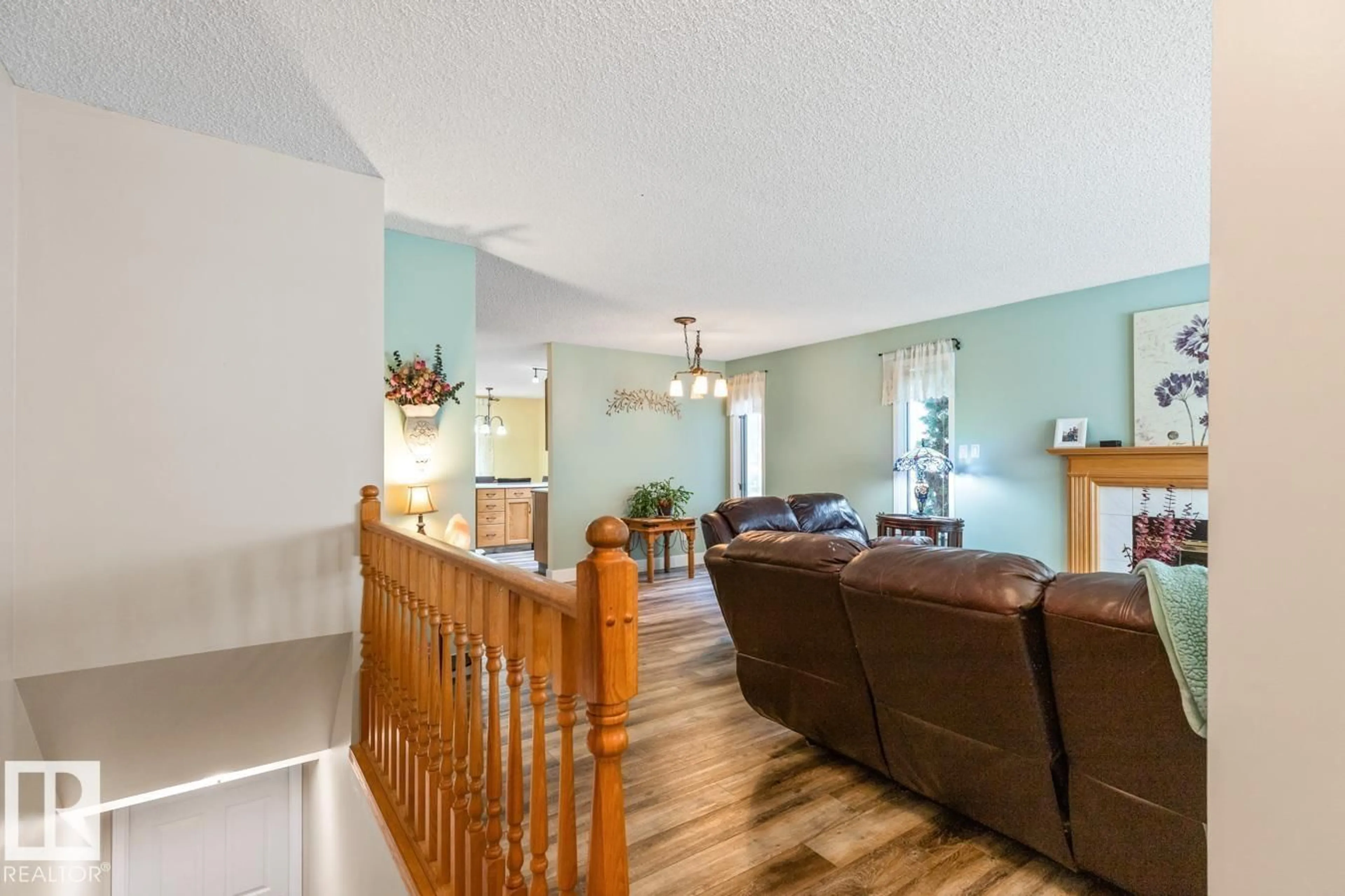 Living room with furniture, wood/laminate floor for 259 REGENCY DR, Sherwood Park Alberta T8A5P4