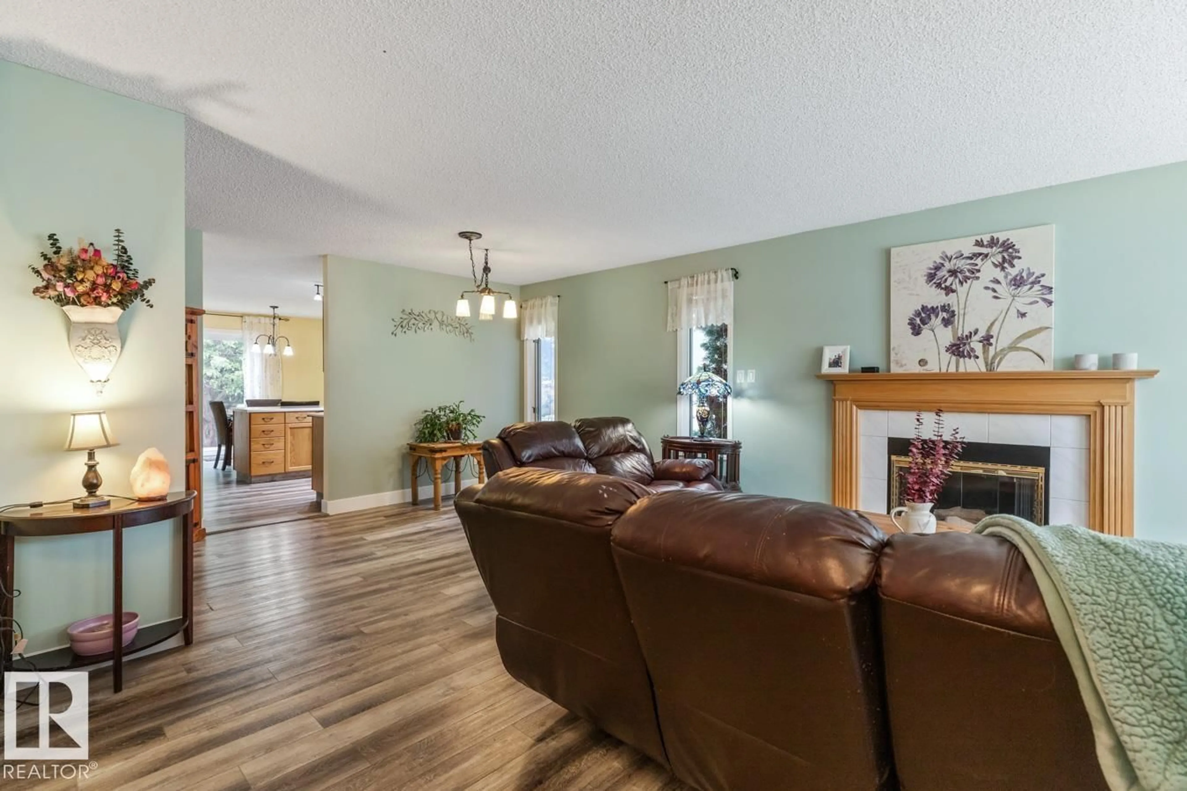 Living room with furniture, wood/laminate floor for 259 REGENCY DR, Sherwood Park Alberta T8A5P4