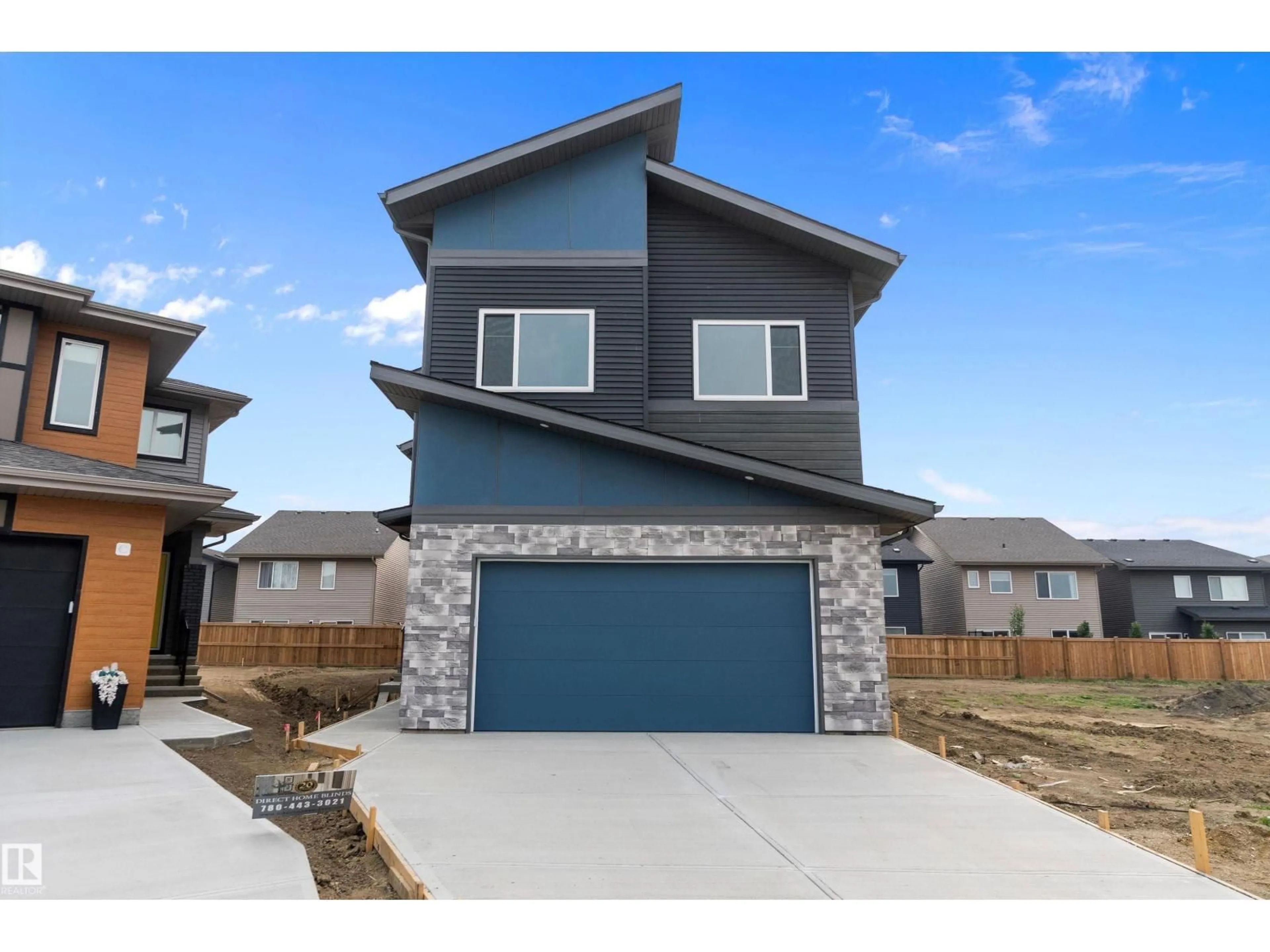 Home with brick exterior material, street for NW - 2547 209 ST, Edmonton Alberta T6M2K7