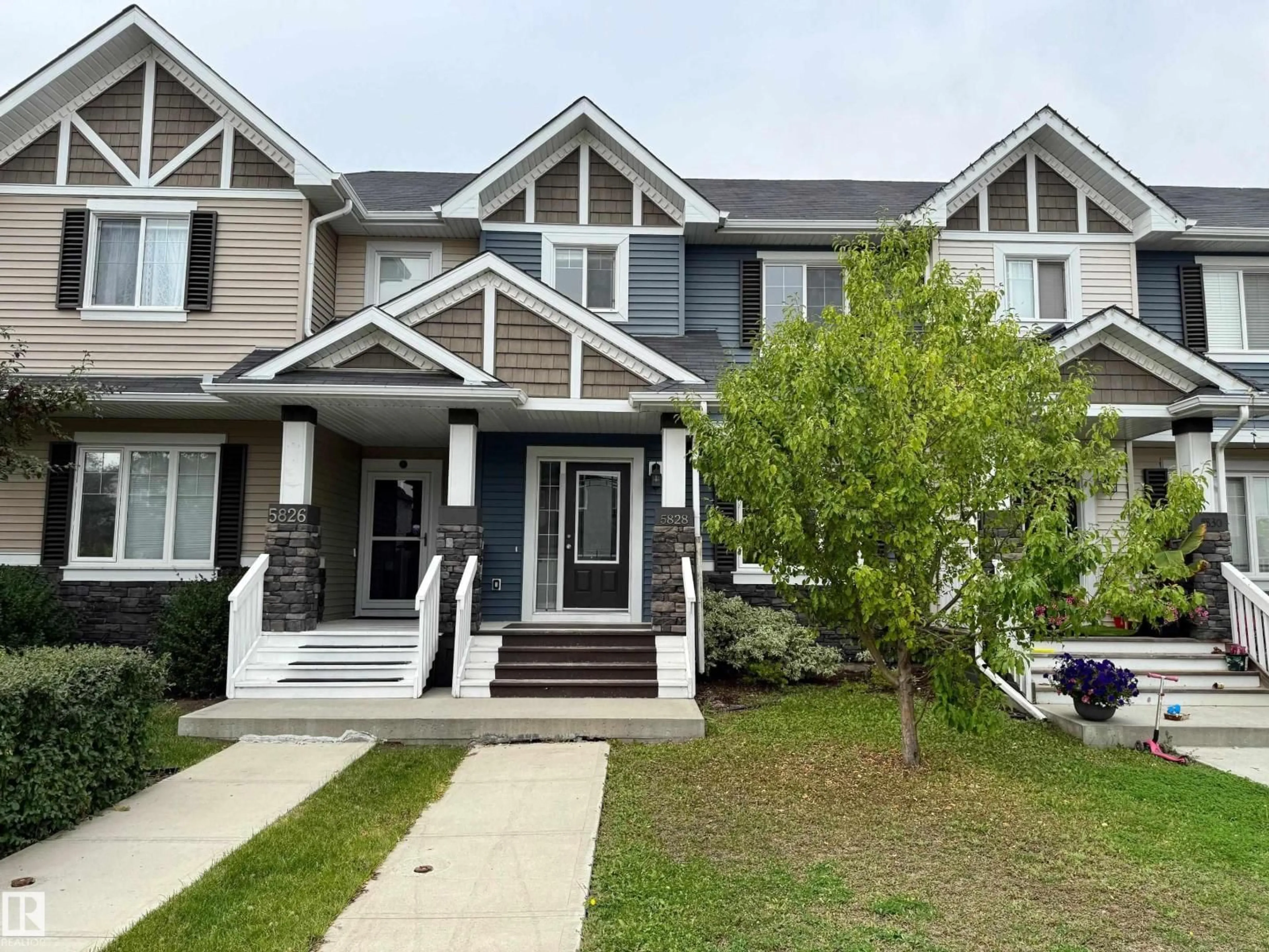 Home with vinyl exterior material, street for 5828 65 ST, Beaumont Alberta T4X2A5