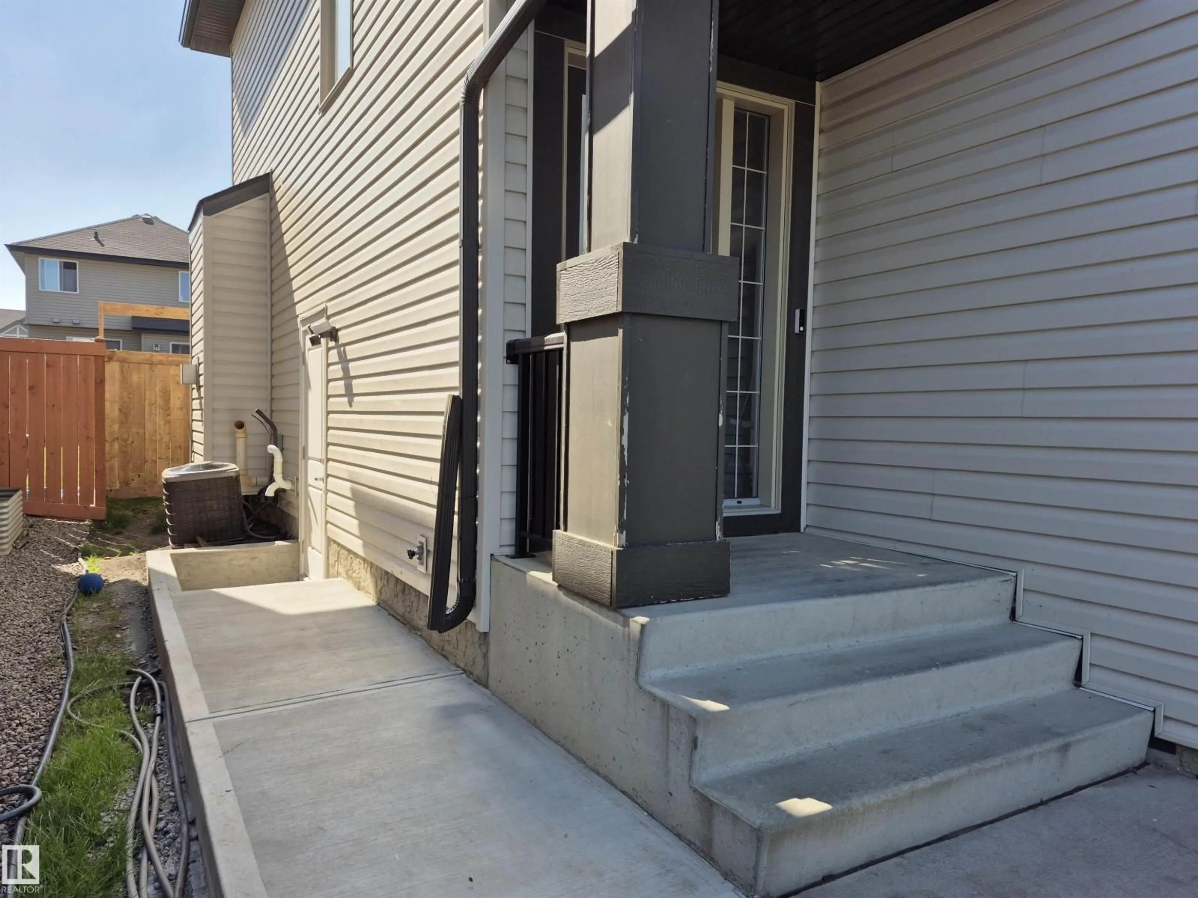 Home with vinyl exterior material, street for 3233 16A AV, Edmonton Alberta T6T0P6