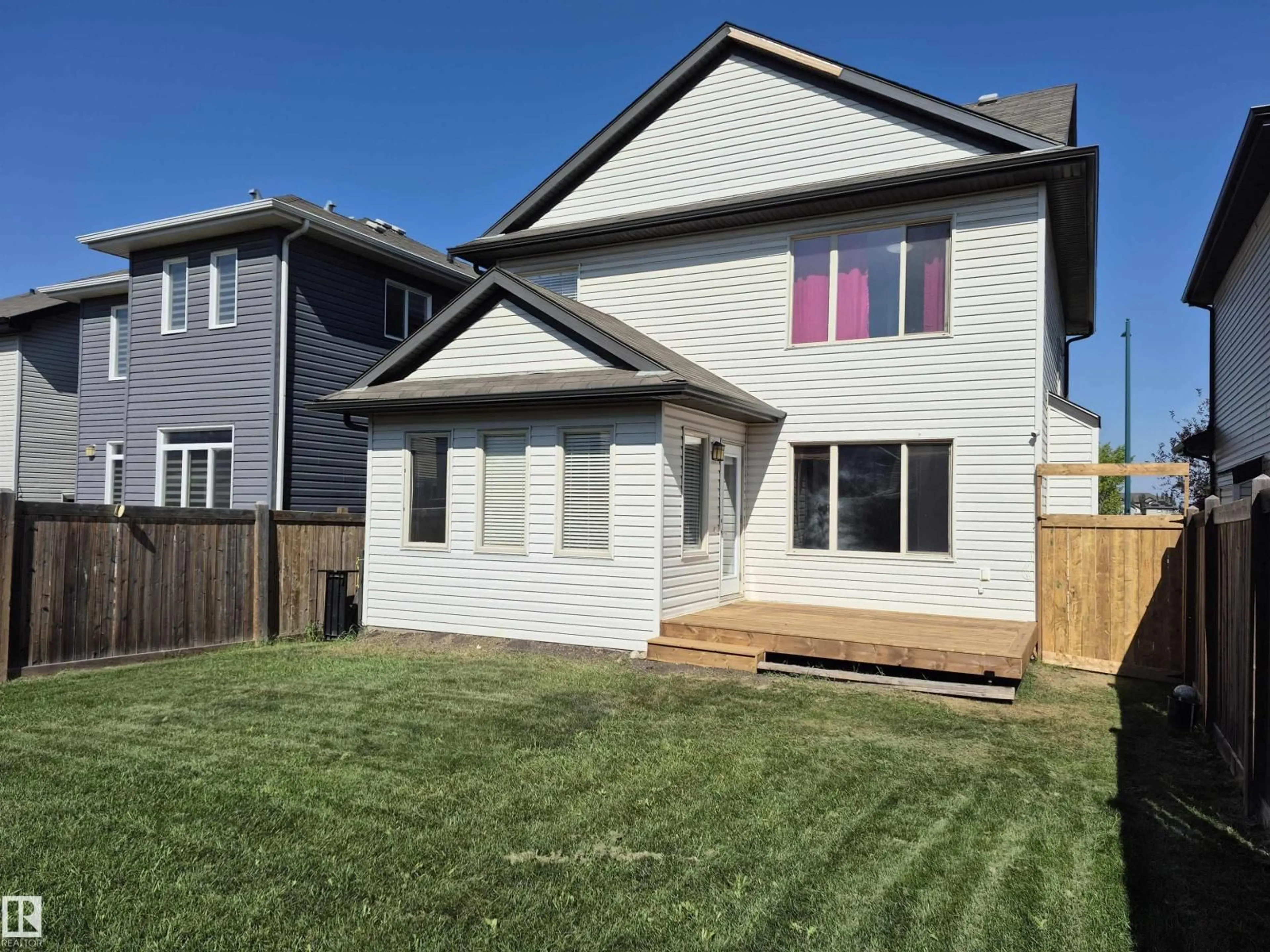 Home with vinyl exterior material, street for 3233 16A AV, Edmonton Alberta T6T0P6
