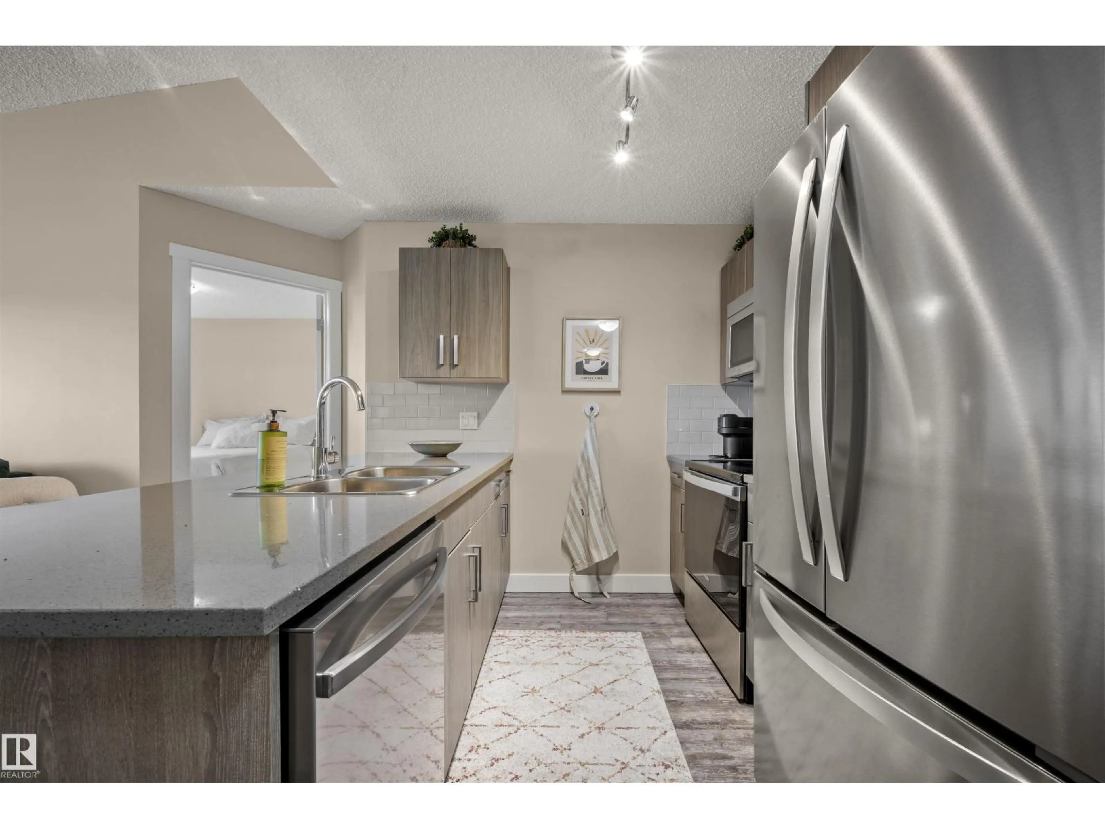 Open concept kitchen, ceramic/tile floor for 416 - 667 WATT BV, Edmonton Alberta T6X0Y2