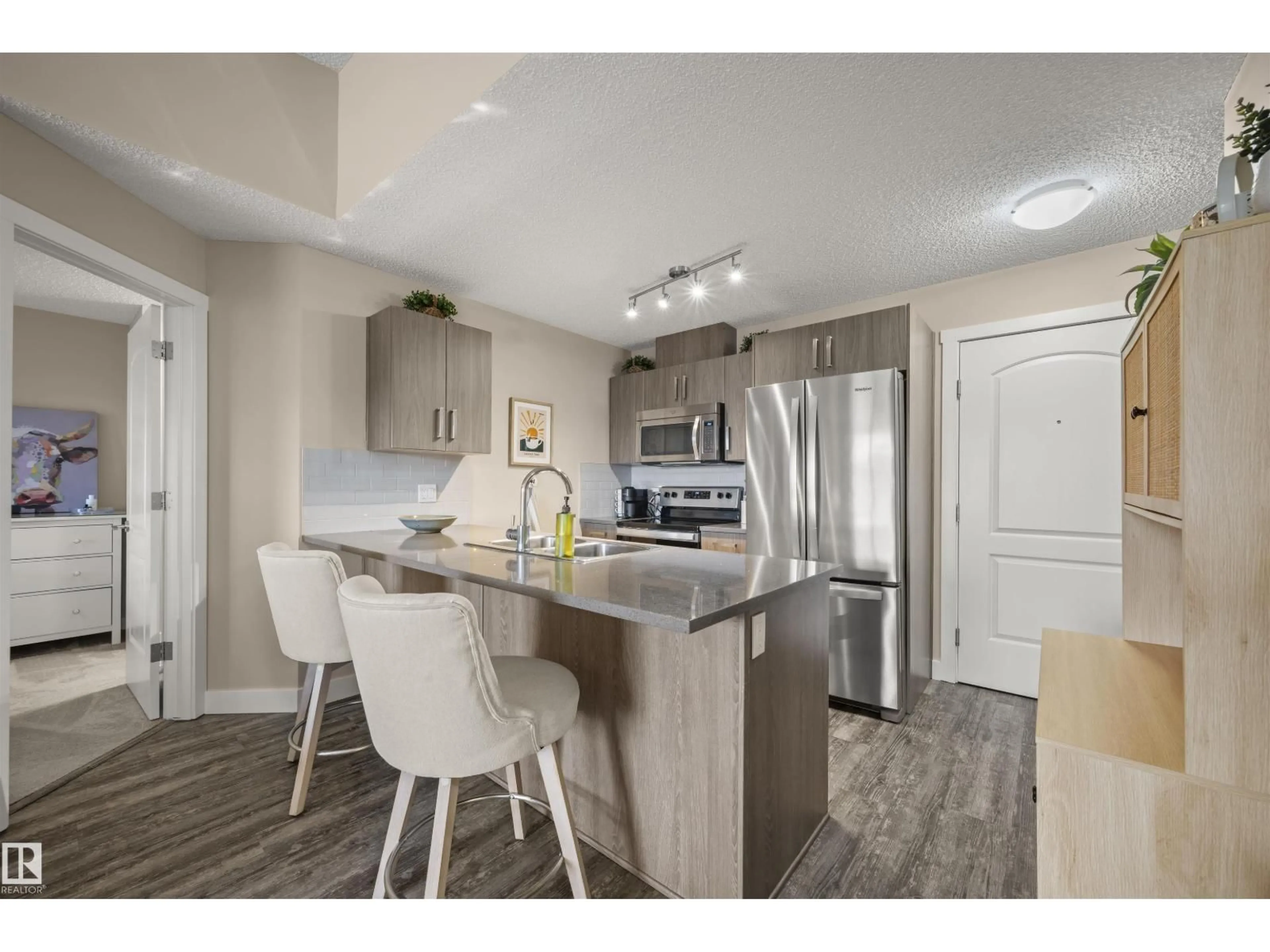 Open concept kitchen, unknown for 416 - 667 WATT BV, Edmonton Alberta T6X0Y2