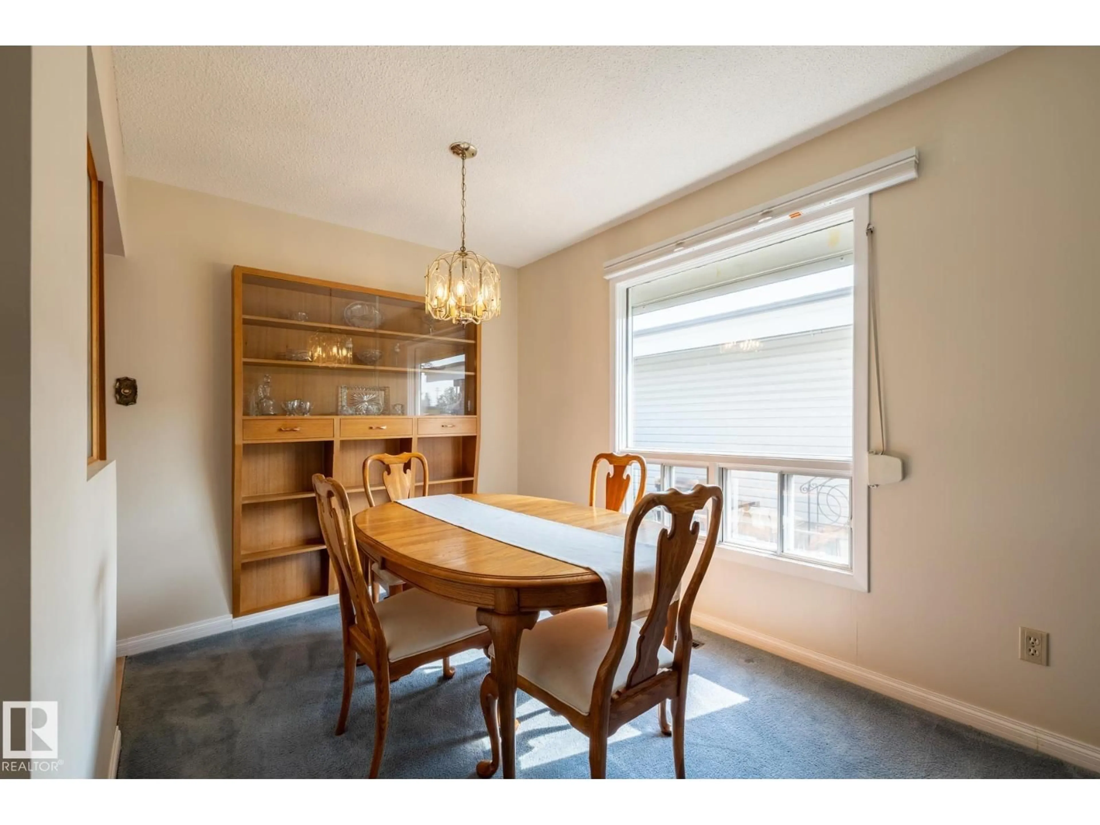 Dining room, wood/laminate floor for NW - 8707 56 ST, Edmonton Alberta T6B1H8
