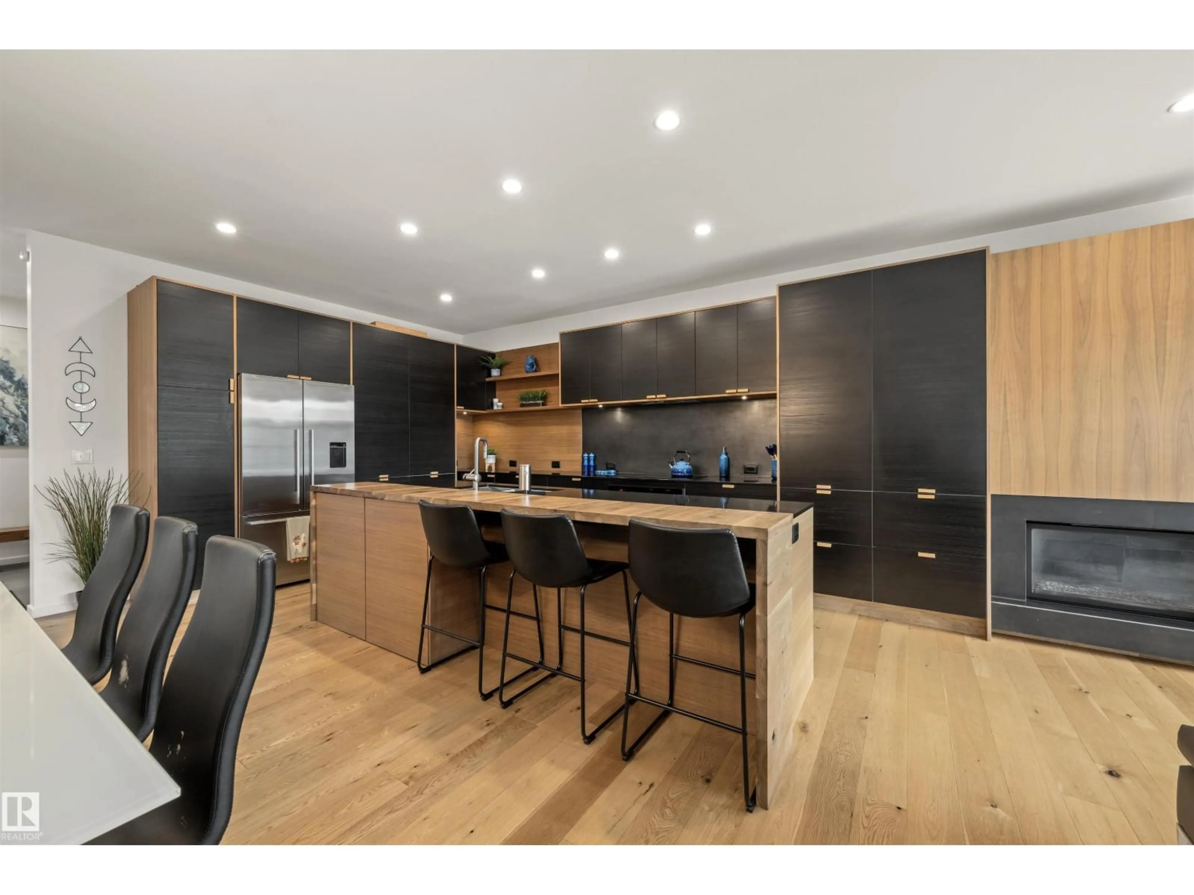 Open concept kitchen, wood/laminate floor for 9761 90 AV, Edmonton Alberta T6E2S8