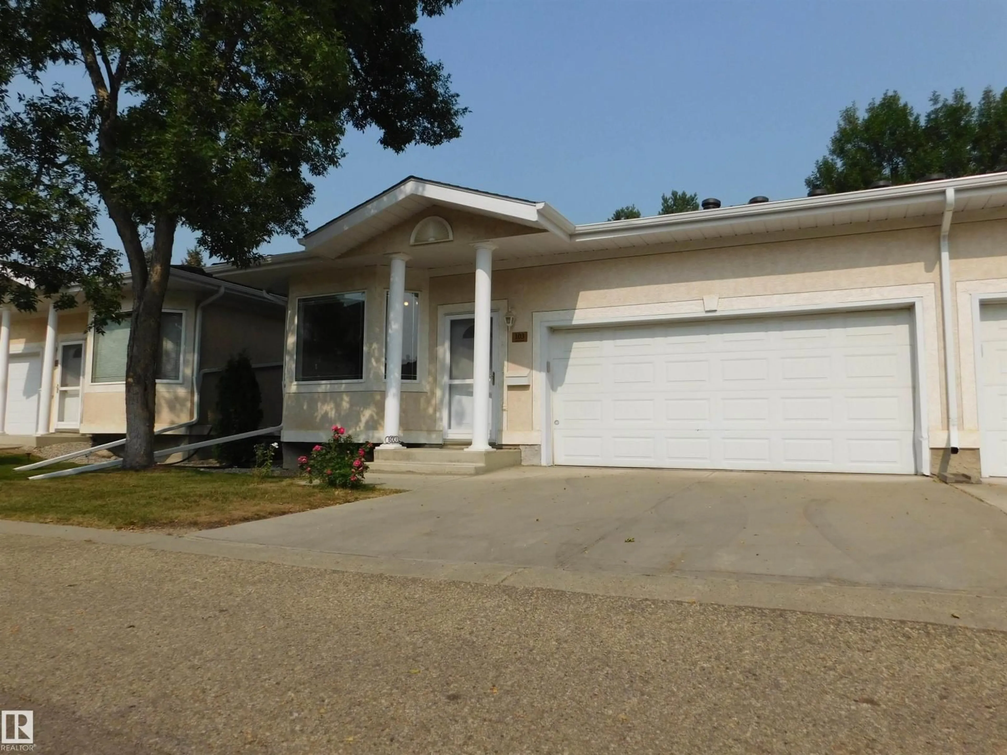 Home with vinyl exterior material, street for 103 FALCONER CO NW, Edmonton Alberta T6R2V8