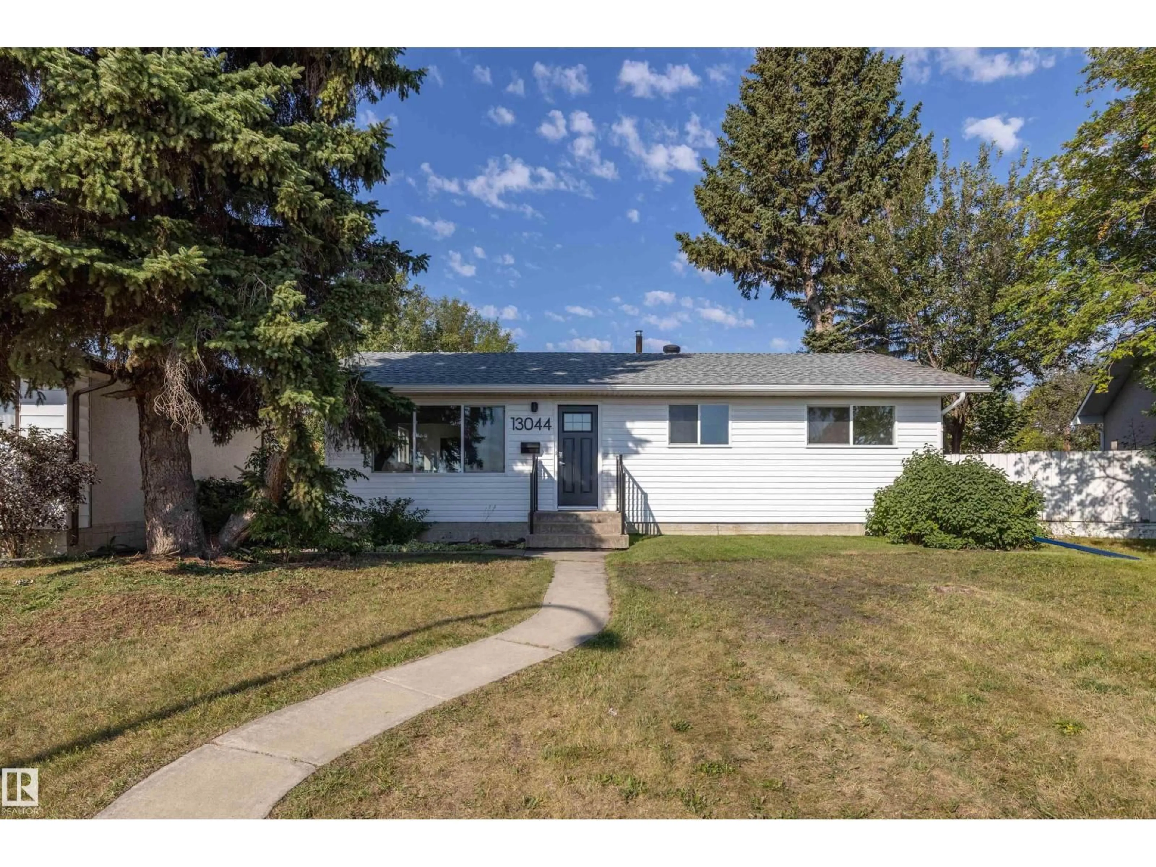 Home with vinyl exterior material, street for 13044 78 ST, Edmonton Alberta T5C2A1