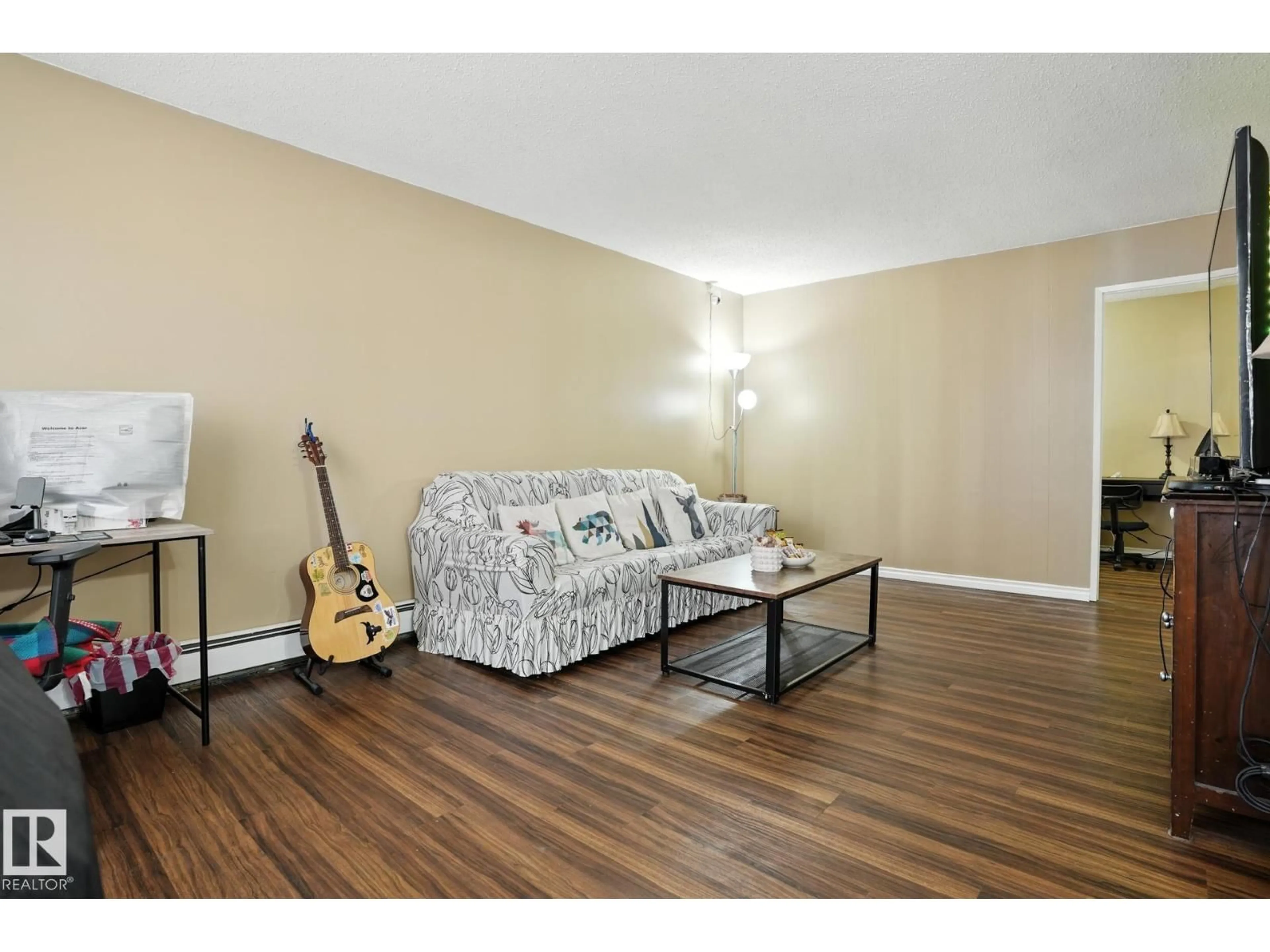 A pic of a room for #201 - 11046 130 ST, Edmonton Alberta T5M0Z7