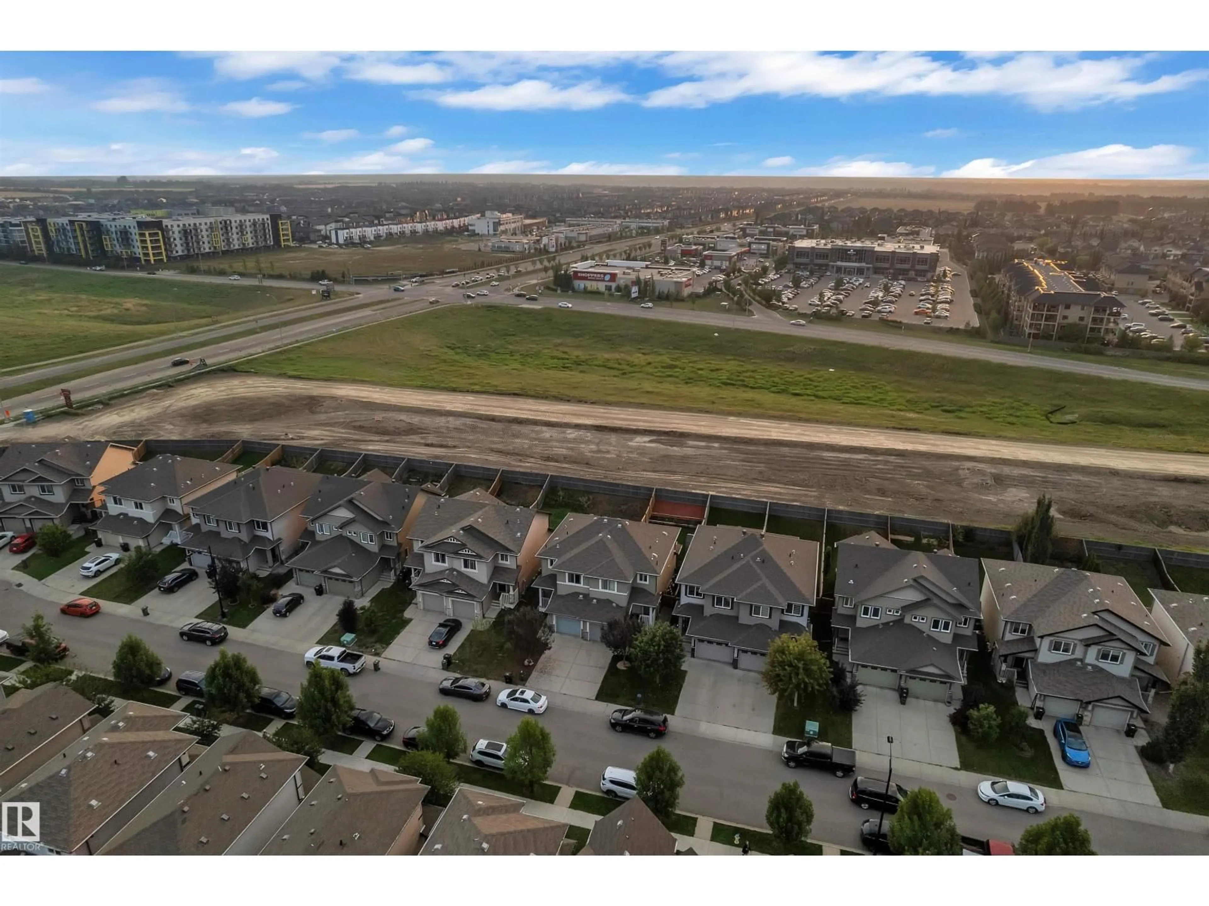 A pic from outside/outdoor area/front of a property/back of a property/a pic from drone, unknown for SW - 7301 ARMOUR CR, Edmonton Alberta T6W2S2