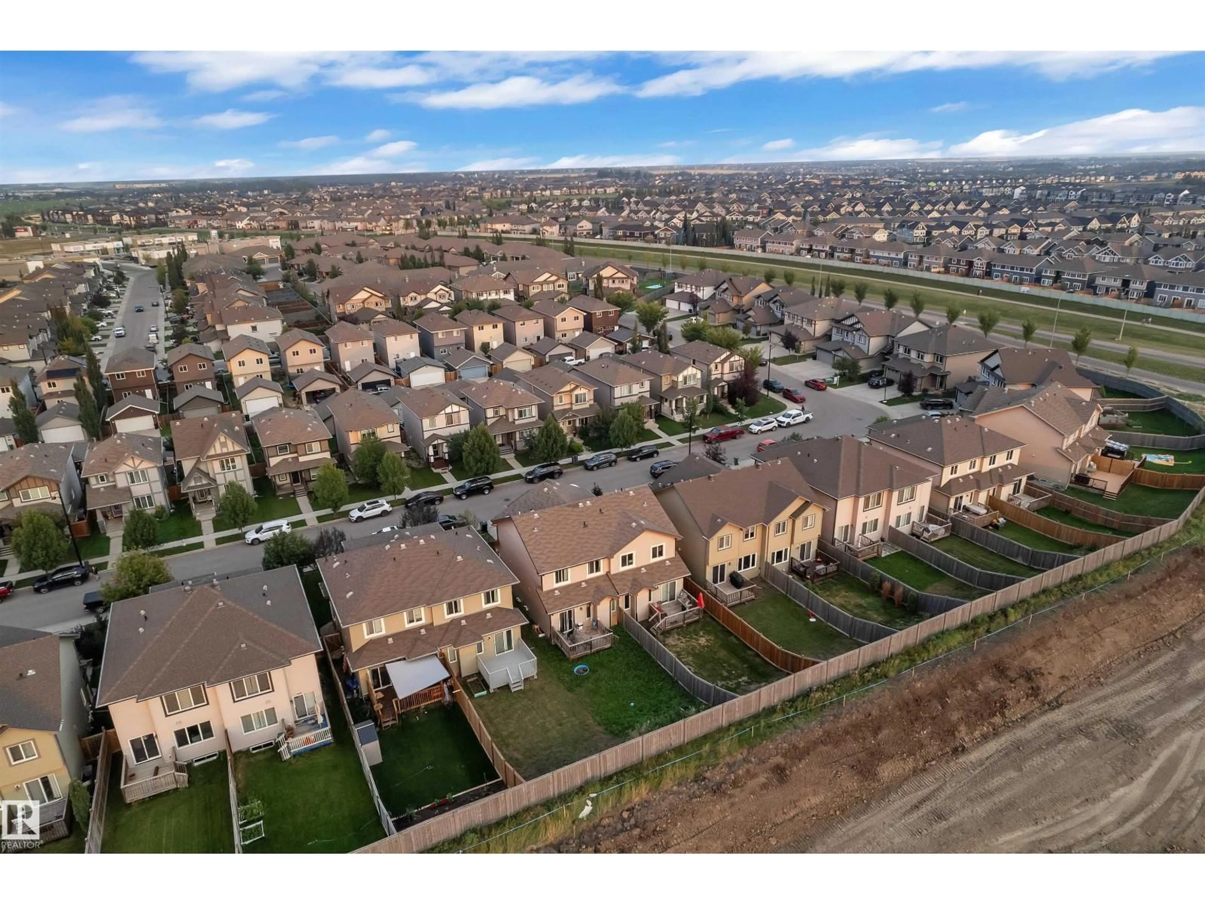 A pic from outside/outdoor area/front of a property/back of a property/a pic from drone, street for SW - 7301 ARMOUR CR, Edmonton Alberta T6W2S2