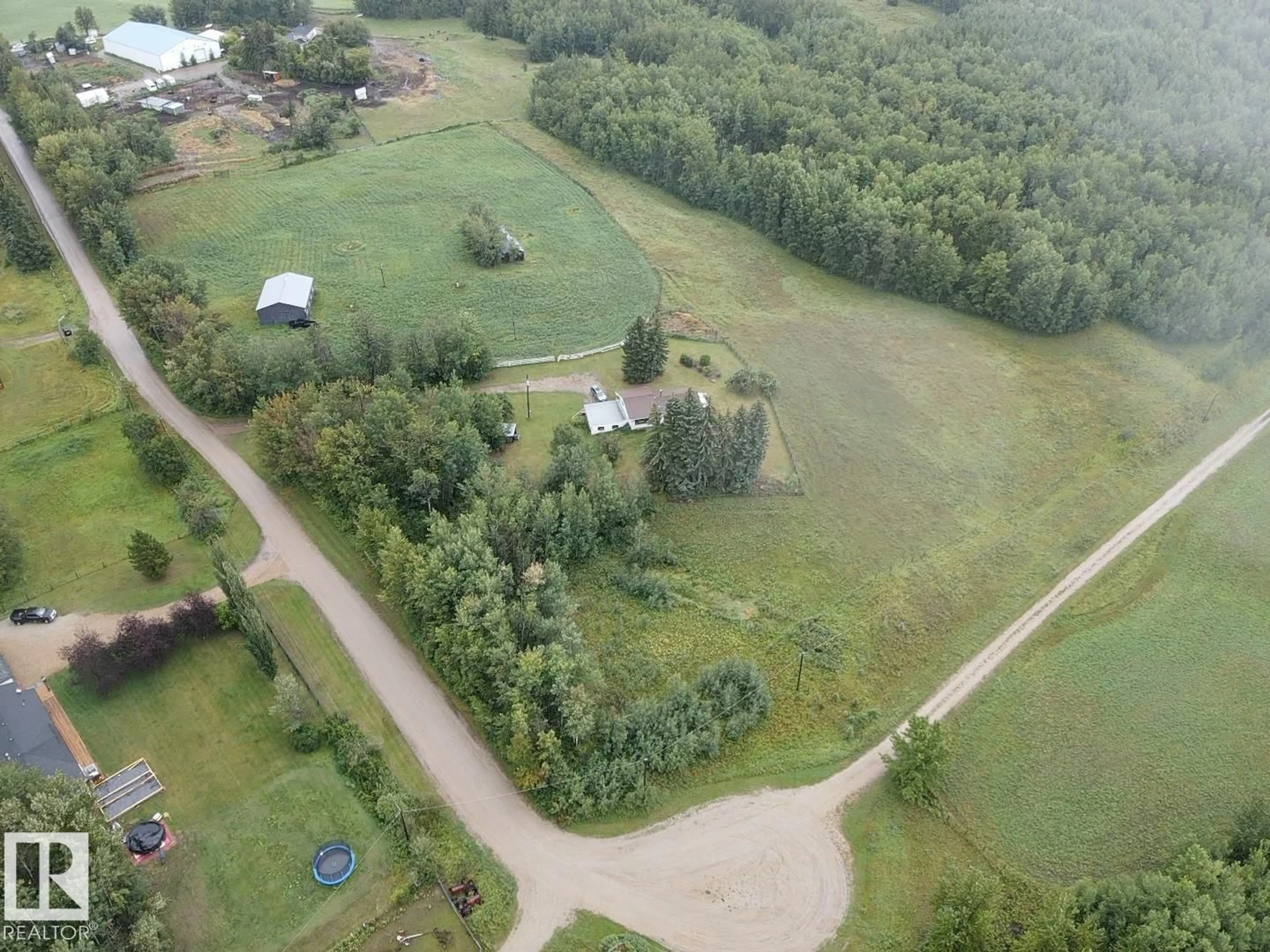 A pic from outside/outdoor area/front of a property/back of a property/a pic from drone, unknown for 2507 TWP ROAD 513, Rural Parkland County Alberta T7Y3H8