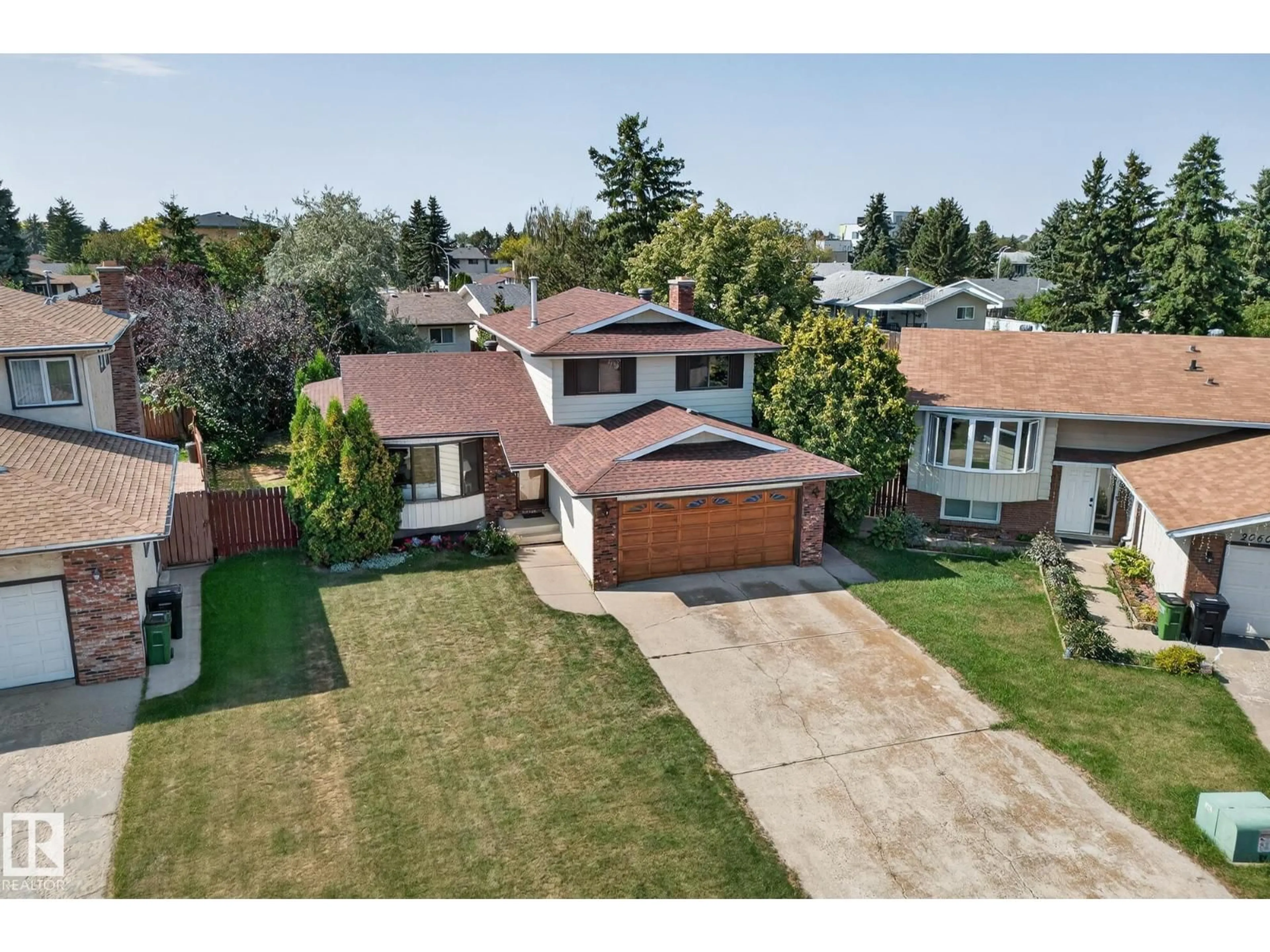 A pic from outside/outdoor area/front of a property/back of a property/a pic from drone, street for NW - 2056 45 ST, Edmonton Alberta T6L2V1