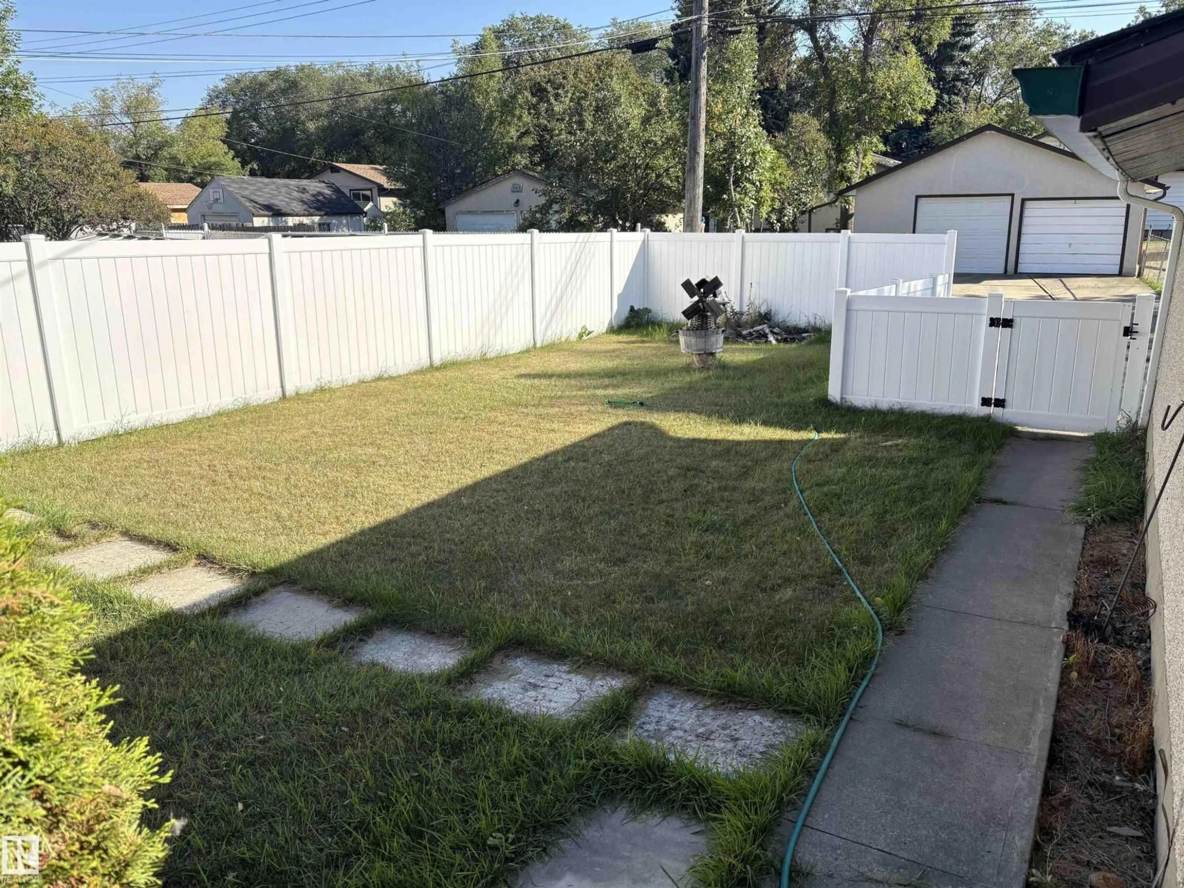 A pic from outside/outdoor area/front of a property/back of a property/a pic from drone, street for 10443 129 AV, Edmonton Alberta T5E0L2