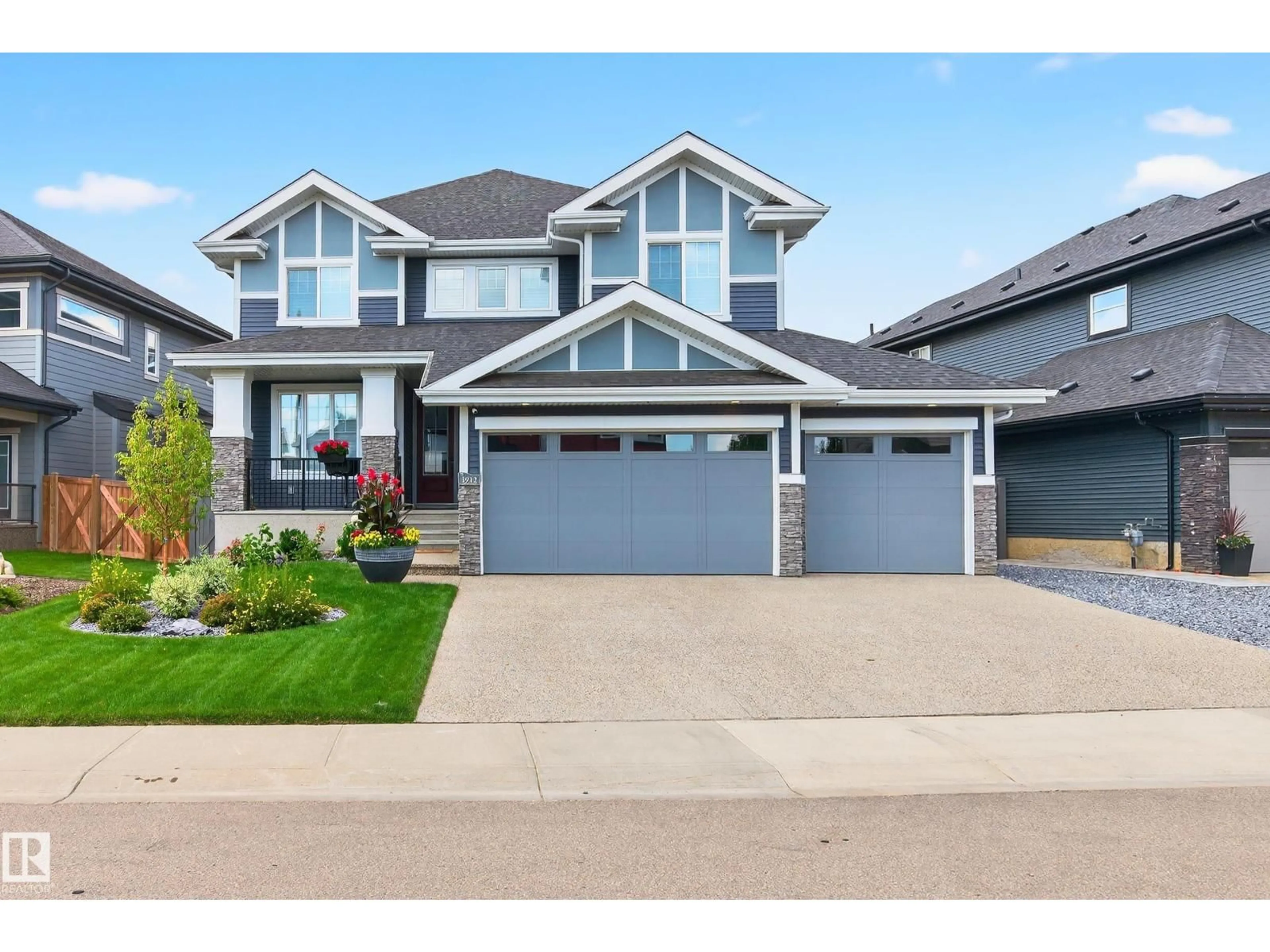 Home with vinyl exterior material, street for 3912 GINSBURG CR, Edmonton Alberta T5T4V1