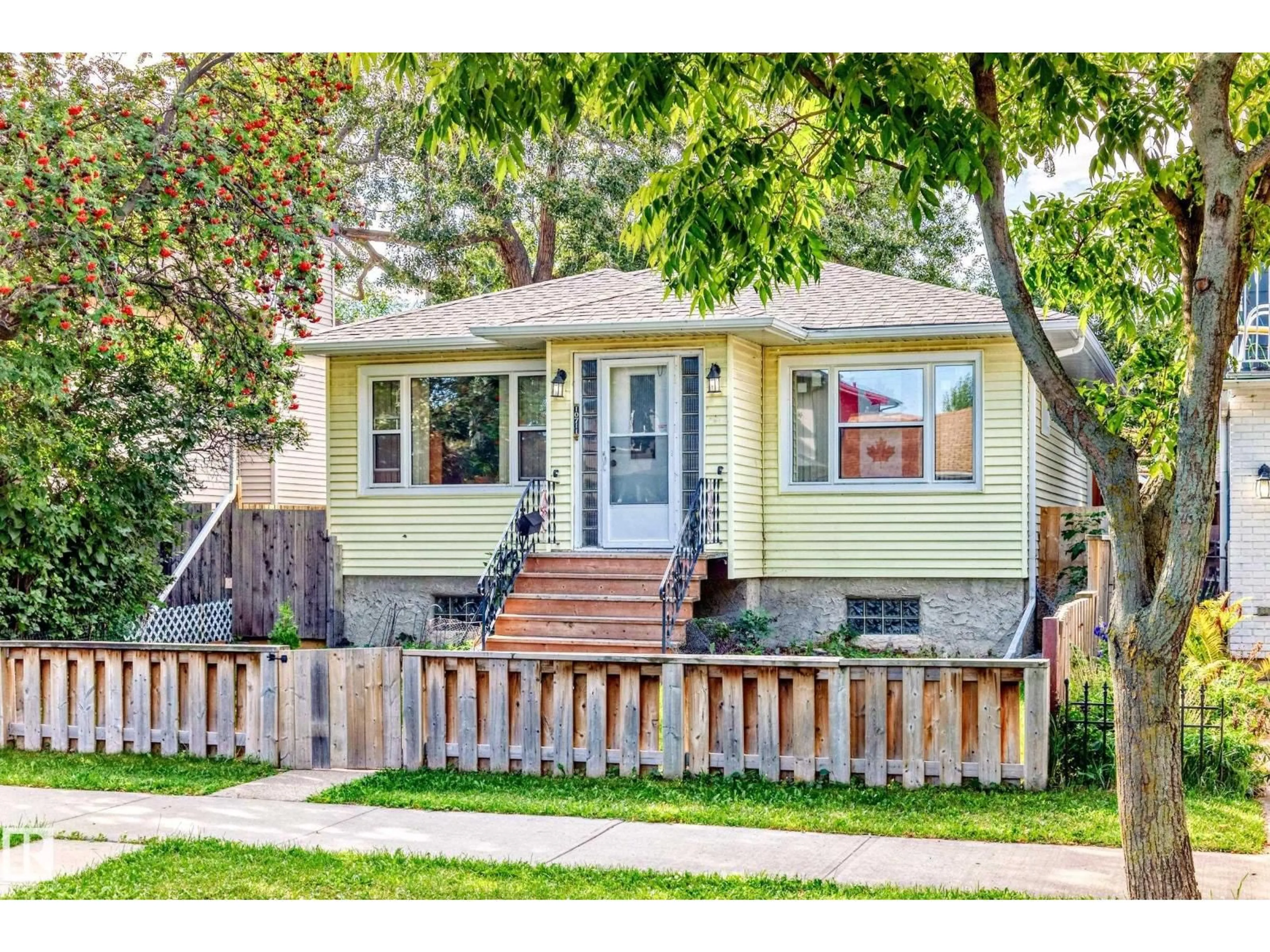 Home with vinyl exterior material, street for 10711 72 AV, Edmonton Alberta T6E1A2