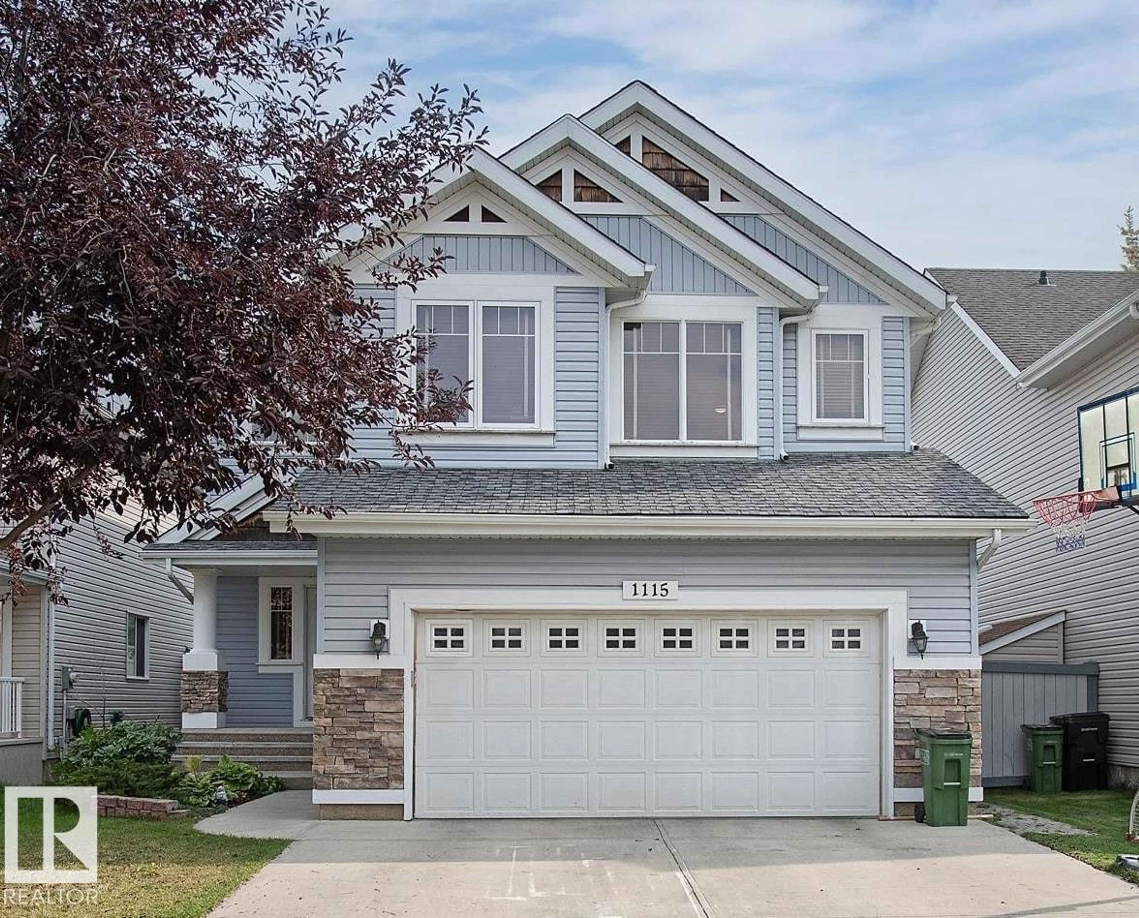 Home with vinyl exterior material, street for SW - 1115 82 ST, Edmonton Alberta T6X1E5