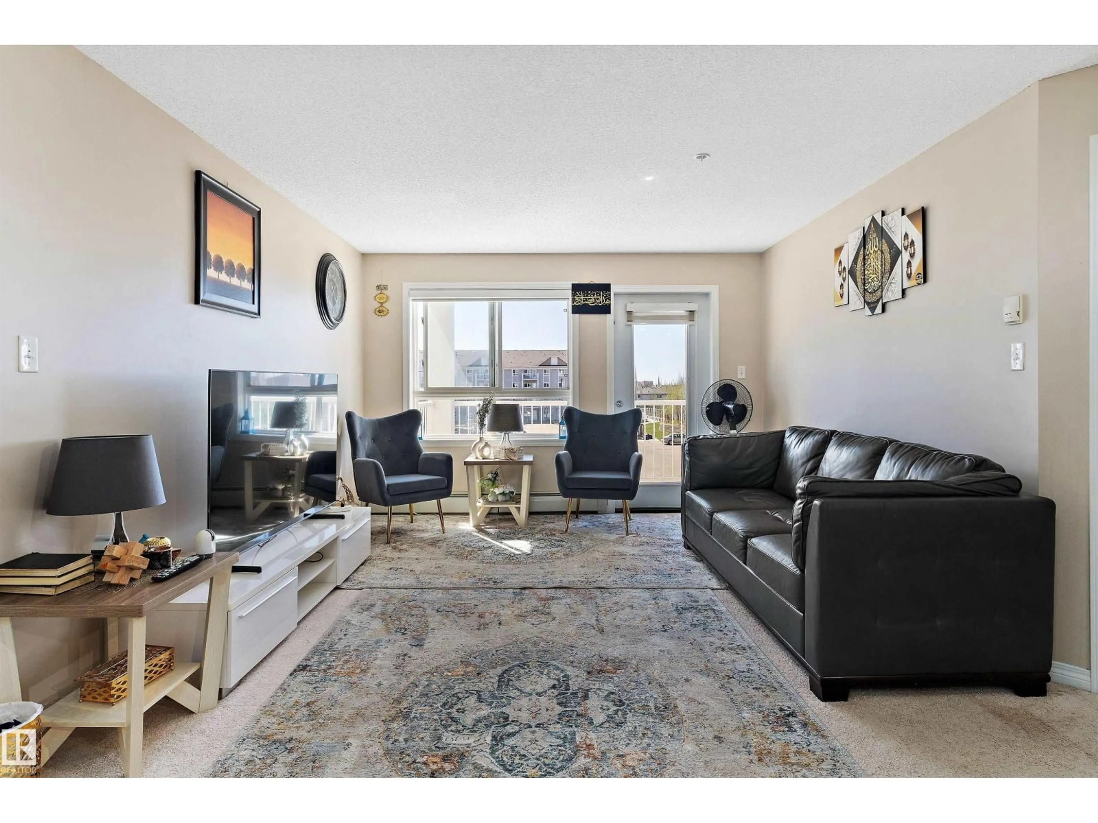Living room with furniture, unknown for 316 - 5350 199 ST, Edmonton Alberta T6M0A5
