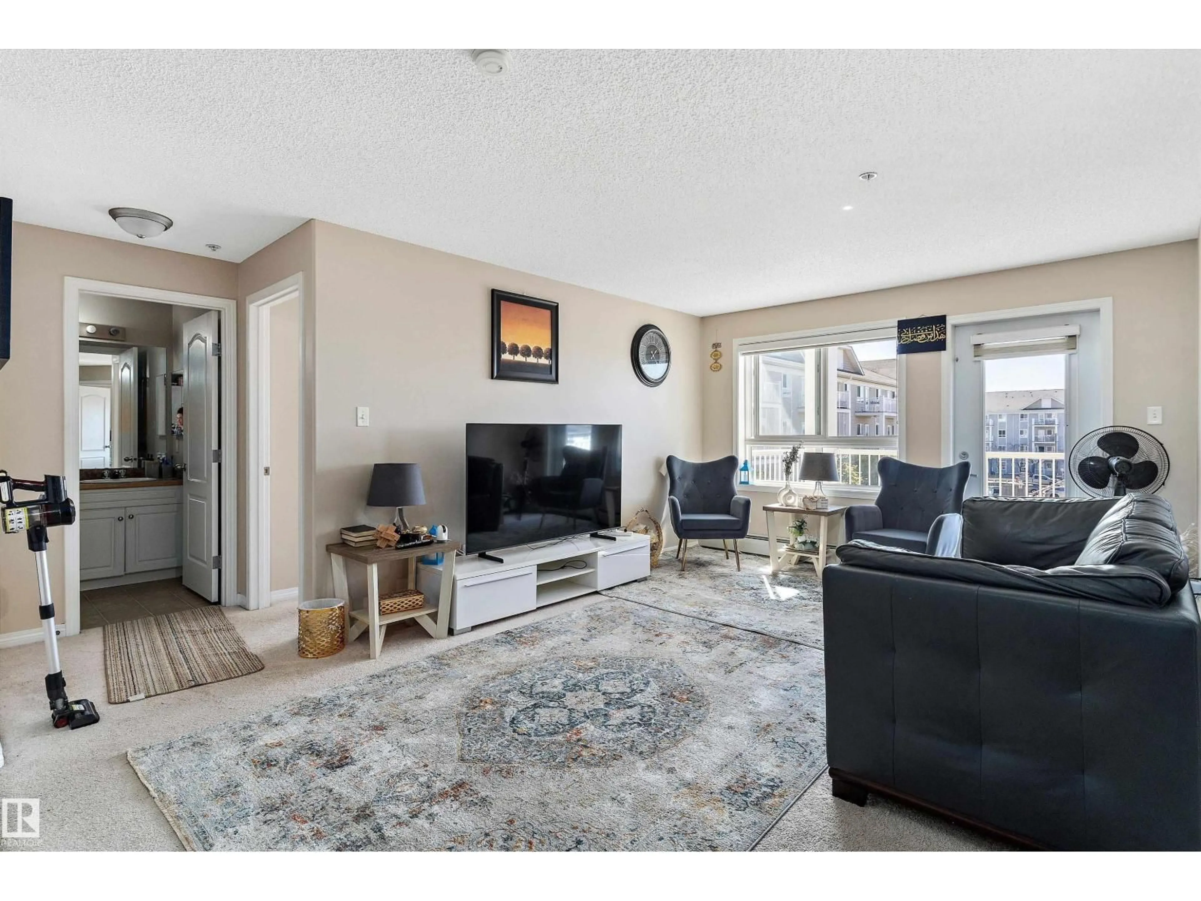 Living room with furniture, unknown for 316 - 5350 199 ST, Edmonton Alberta T6M0A5