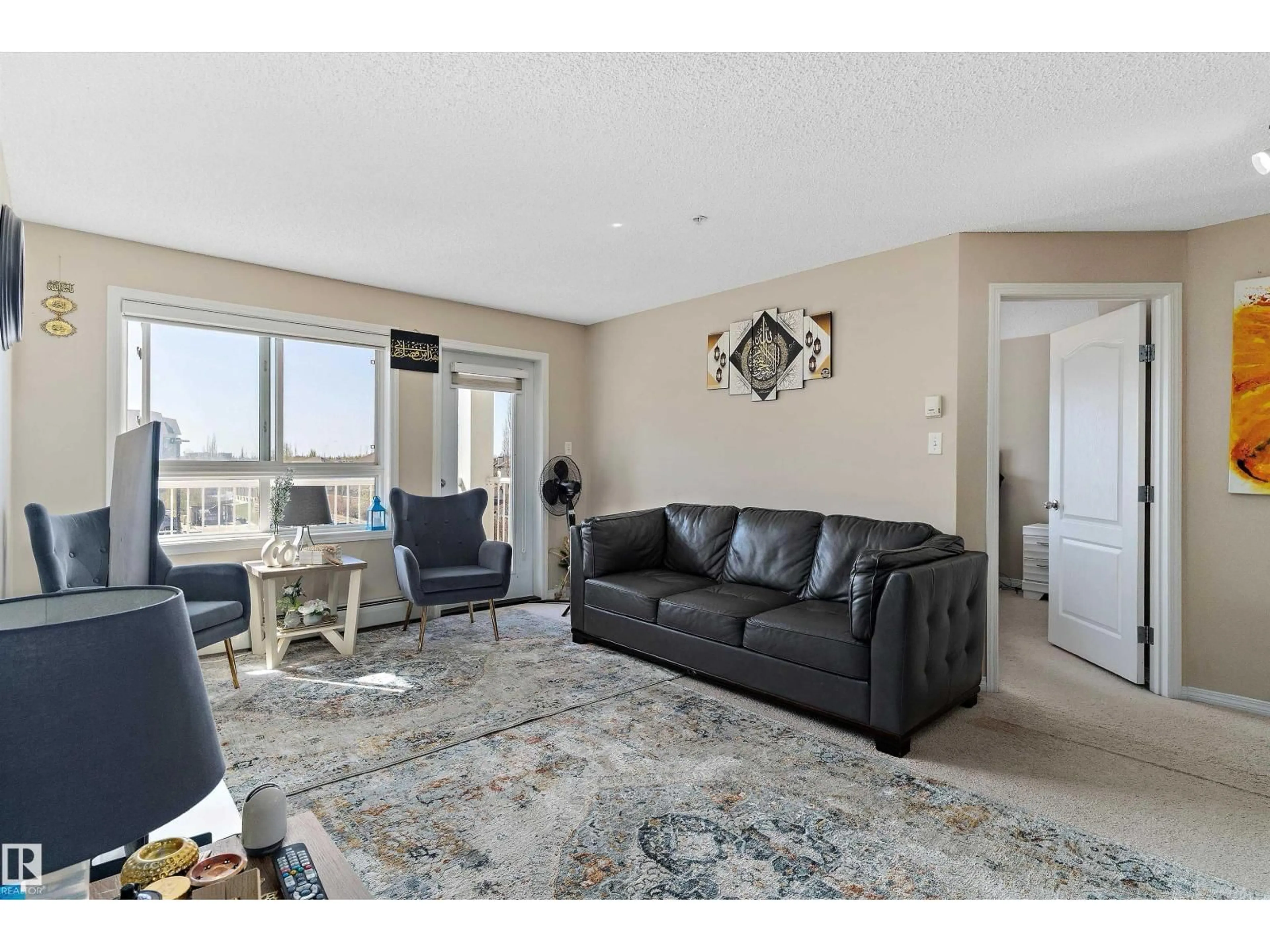 Living room with furniture, unknown for 316 - 5350 199 ST, Edmonton Alberta T6M0A5