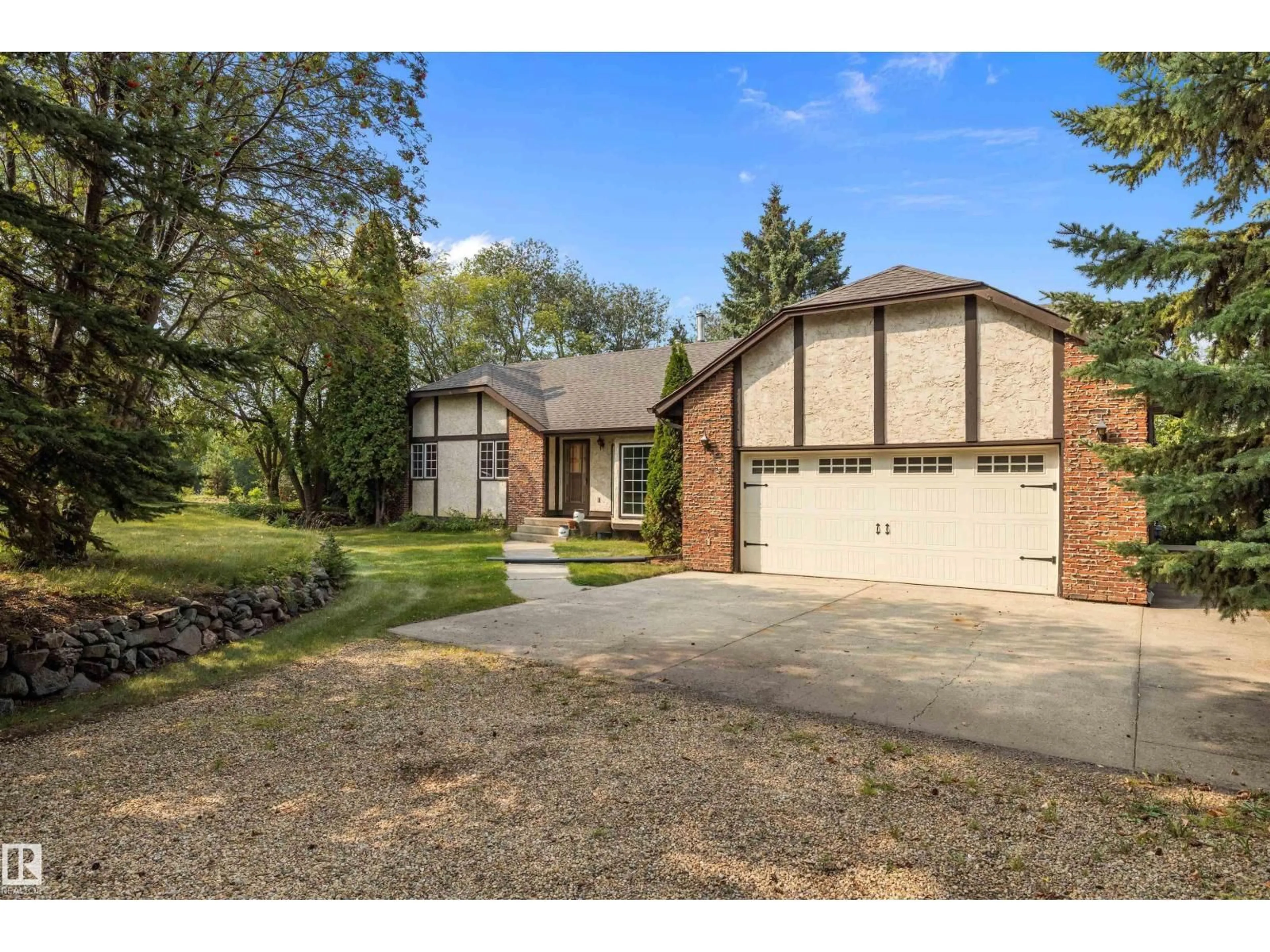 Home with brick exterior material, street for 35 24119 TWP ROAD 554, Rural Sturgeon County Alberta T8T1X7