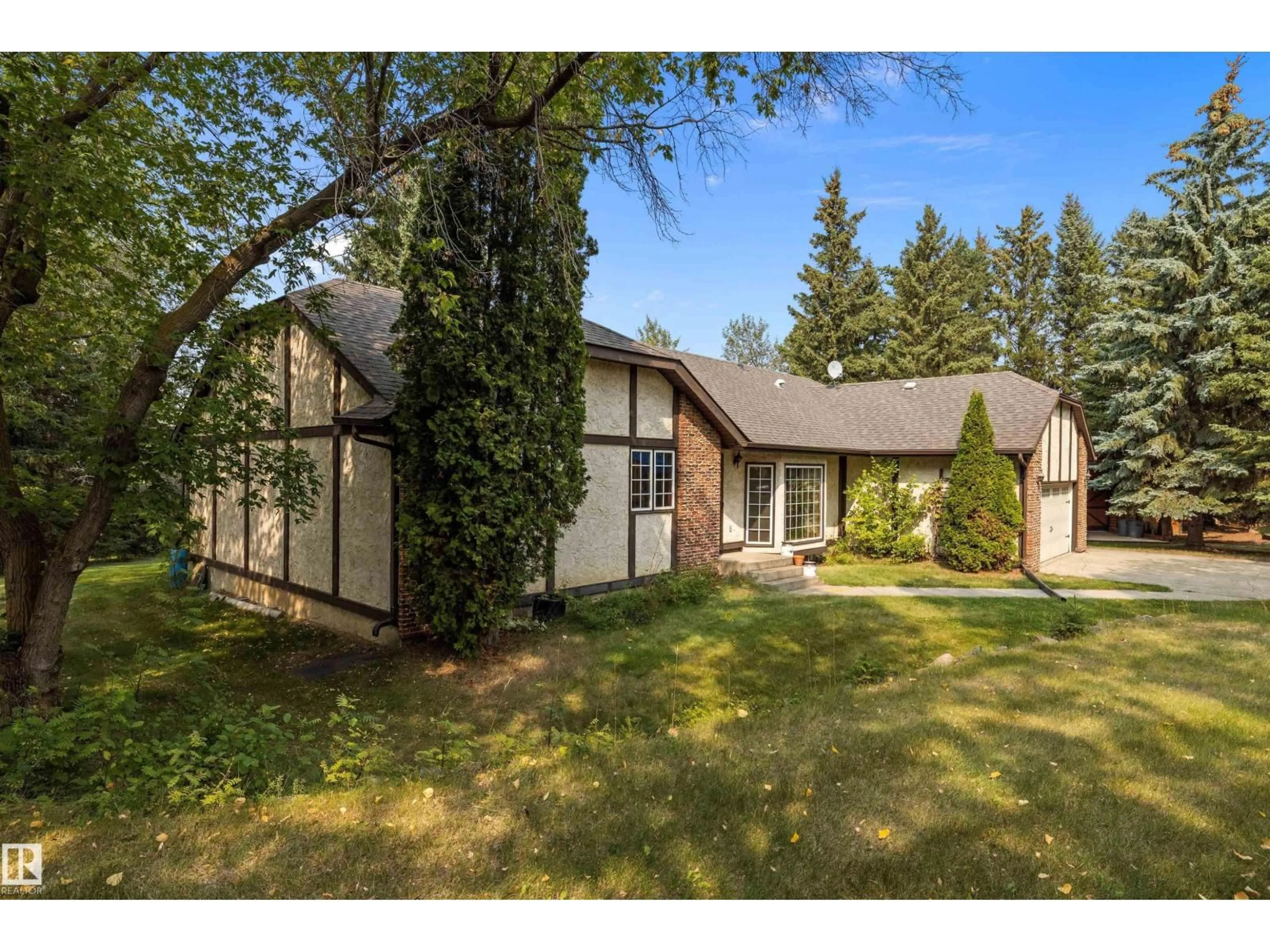 A pic from outside/outdoor area/front of a property/back of a property/a pic from drone, unknown for 35 24119 TWP ROAD 554, Rural Sturgeon County Alberta T8T1X7